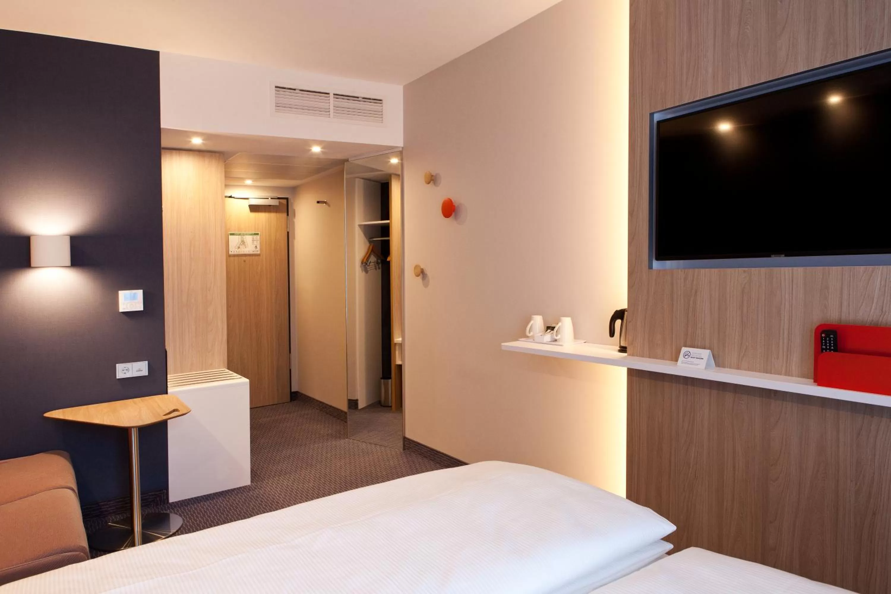Bedroom, Bed in Holiday Inn Express & Suites - Basel - Allschwil by IHG