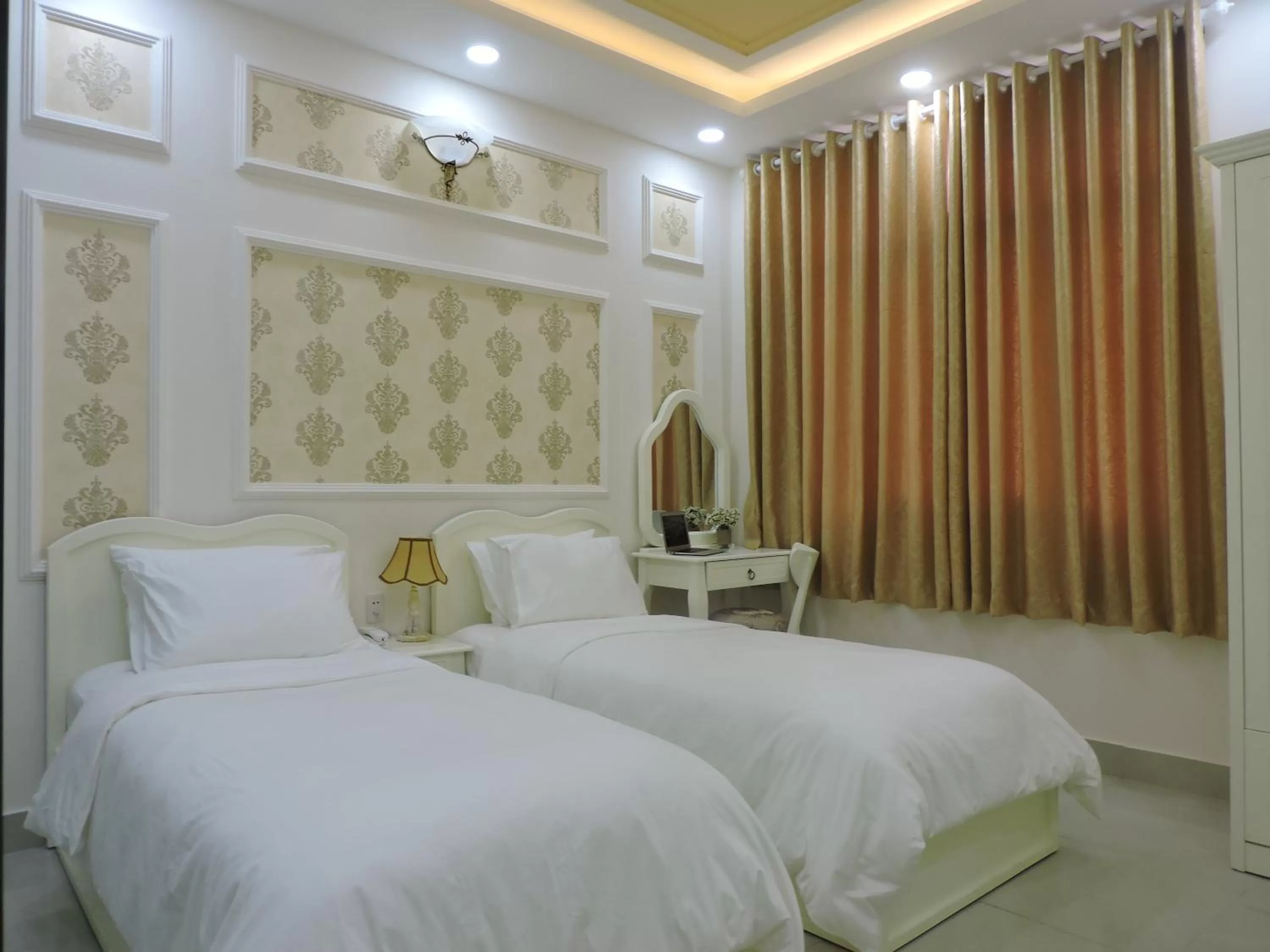 Bed in Chez Lotus Rose