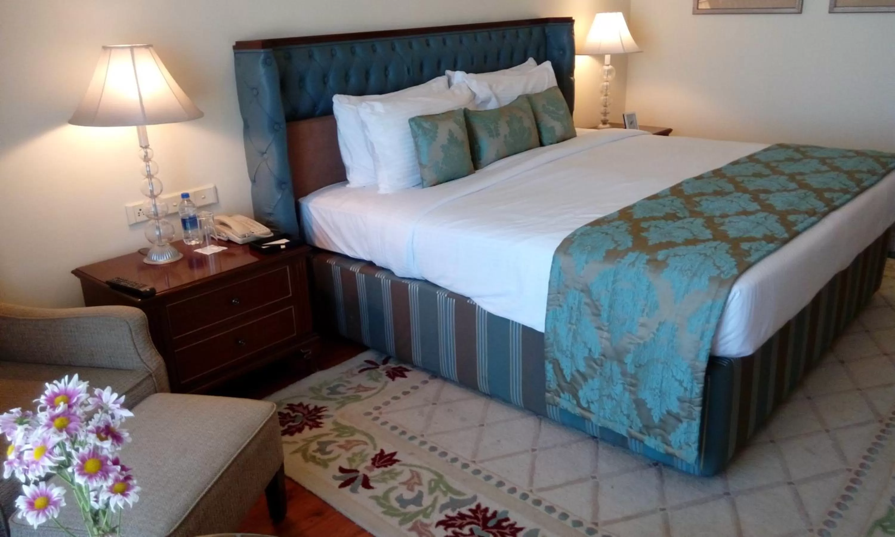 Photo of the whole room, Bed in Taj Krishna