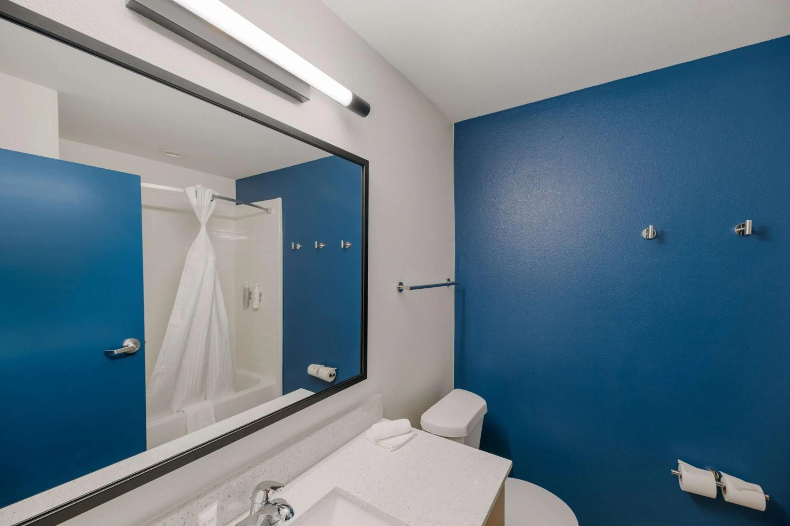 Bathroom in Spark by Hilton Midland South