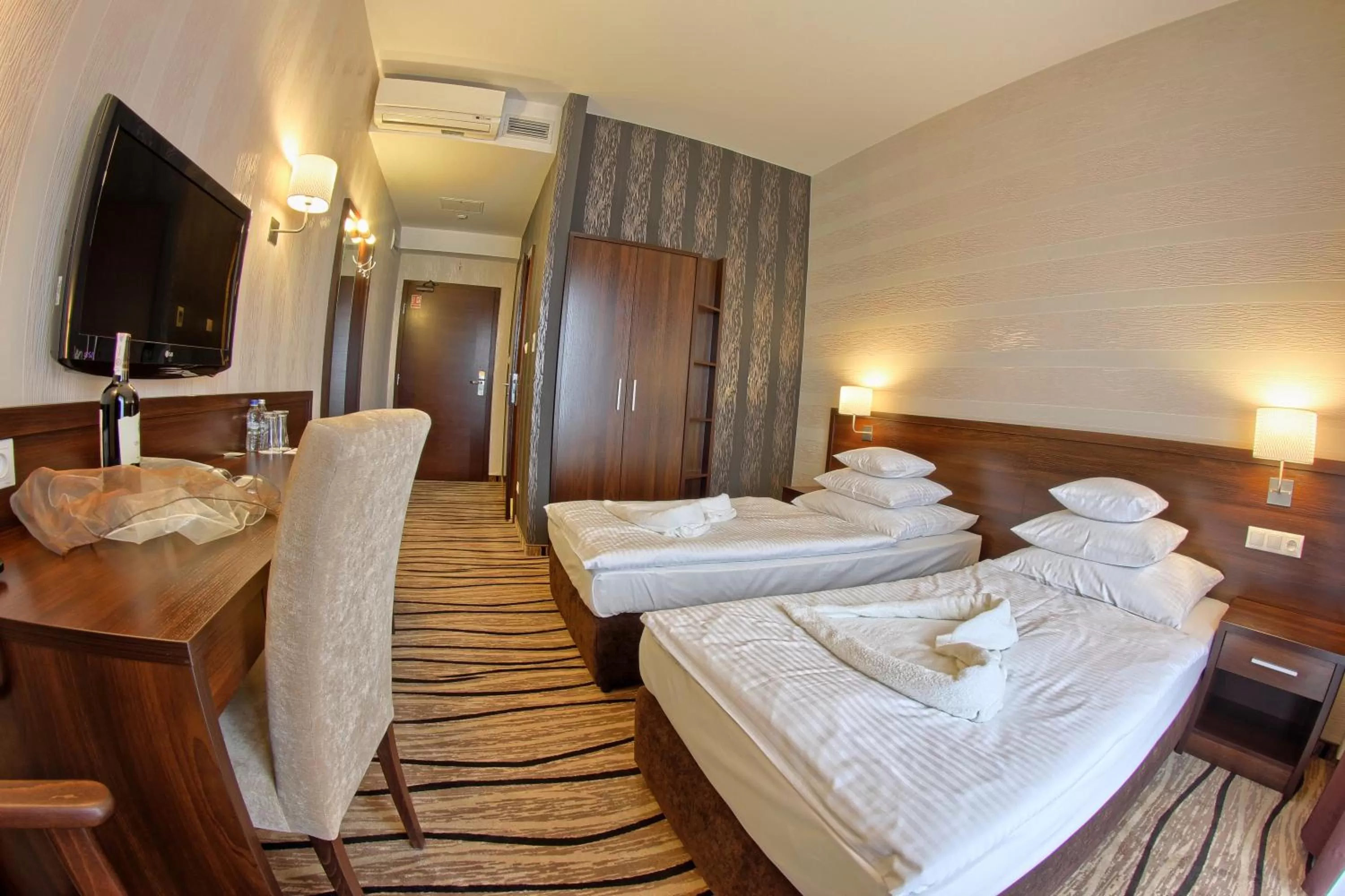 Bed in Hotel Arkas