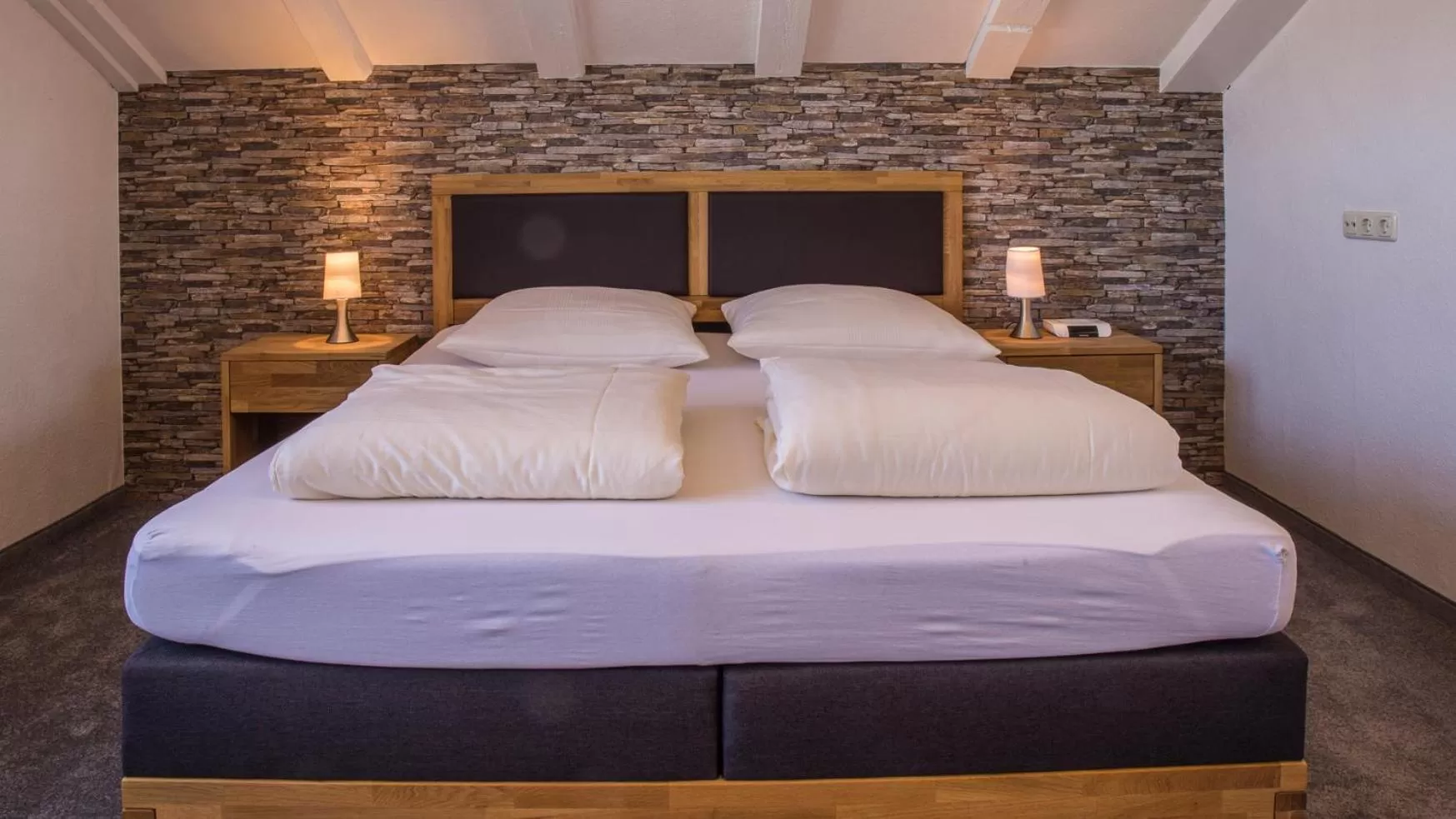 Living room, Bed in Hotel Brandl