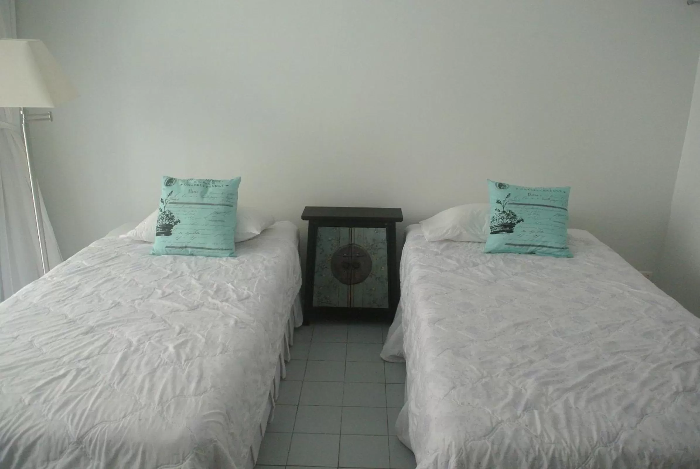 Bed in Oriental Smile Hotel