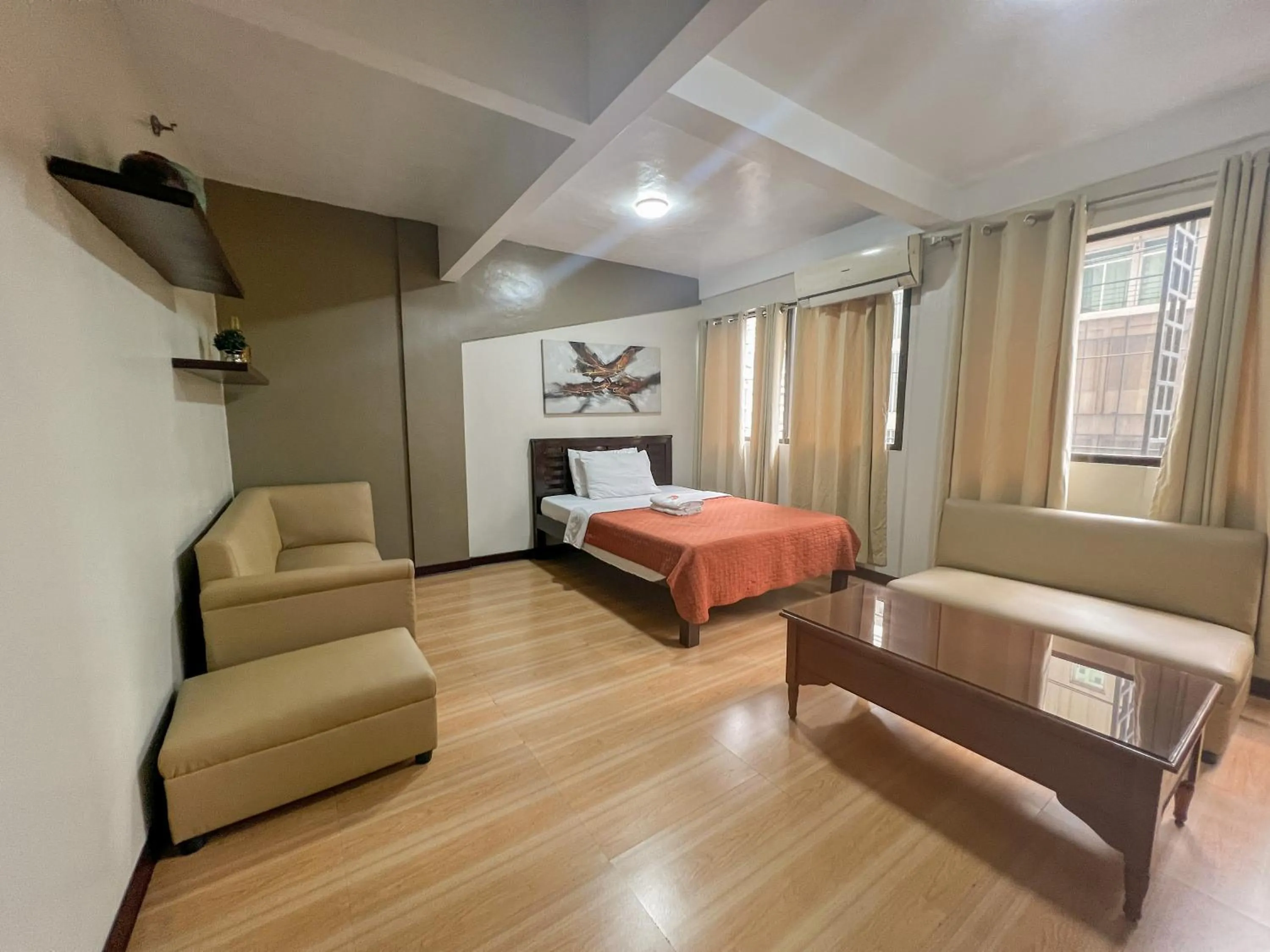 Photo of the whole room, Bed in Stone House Hotel Manila