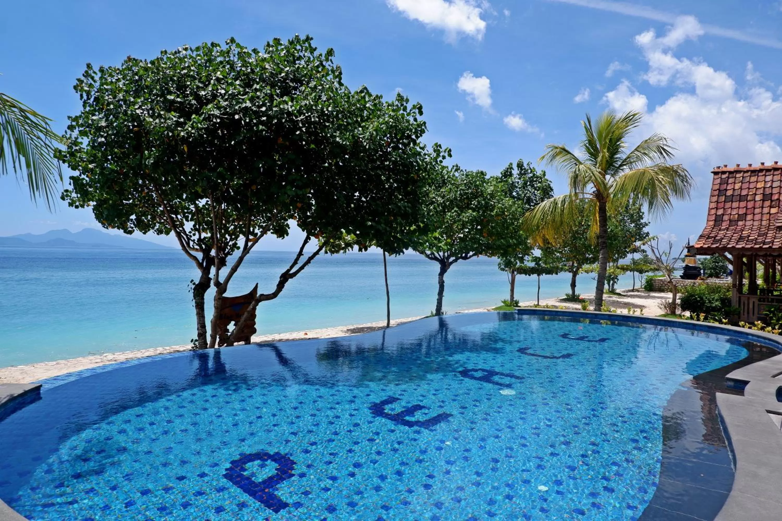 Swimming pool in Blue Harbor Beachfront Villas & Resto