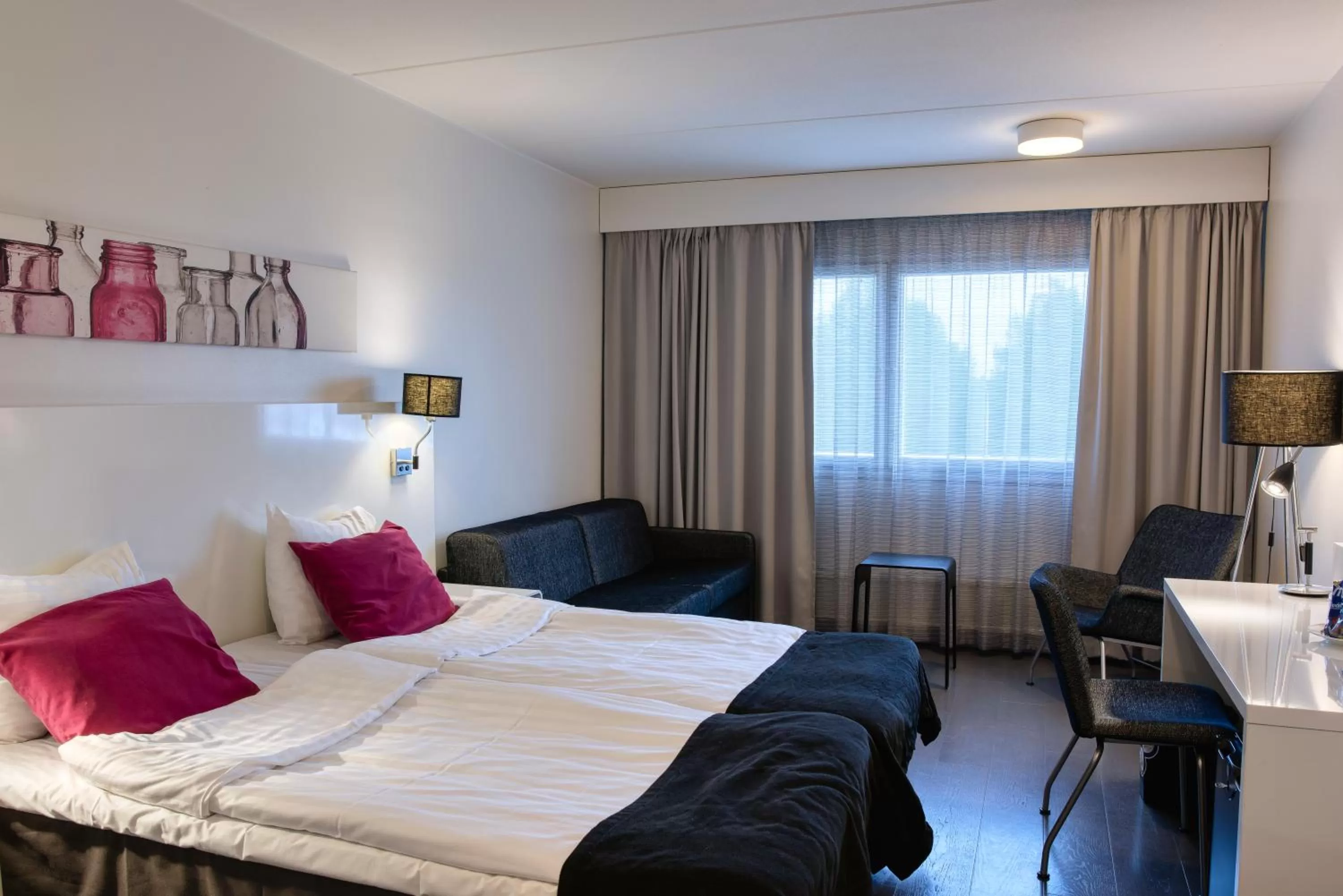 Photo of the whole room, Bed in Teatterihotelli Riihimäki