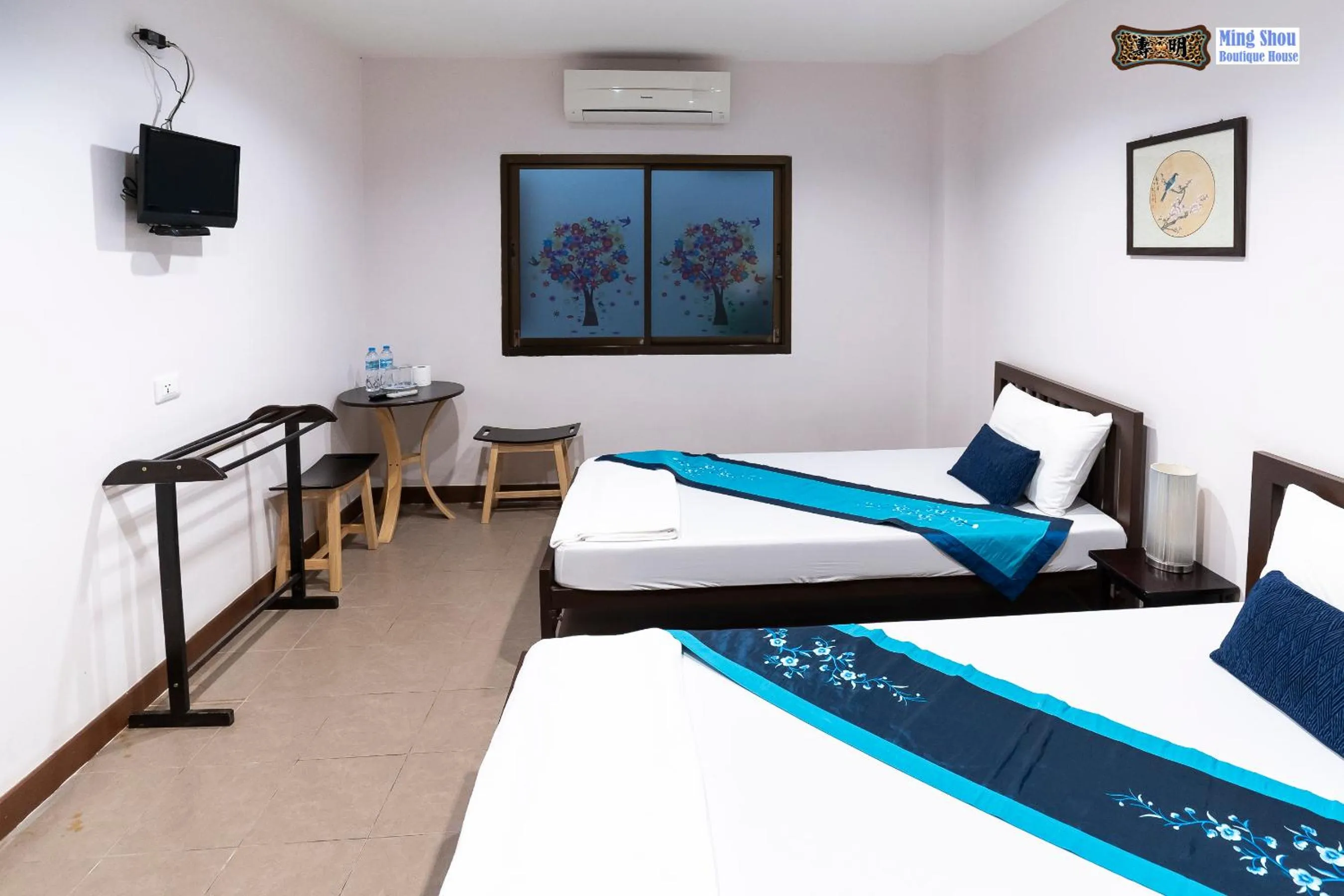 Bed in Ming Shou Boutique House