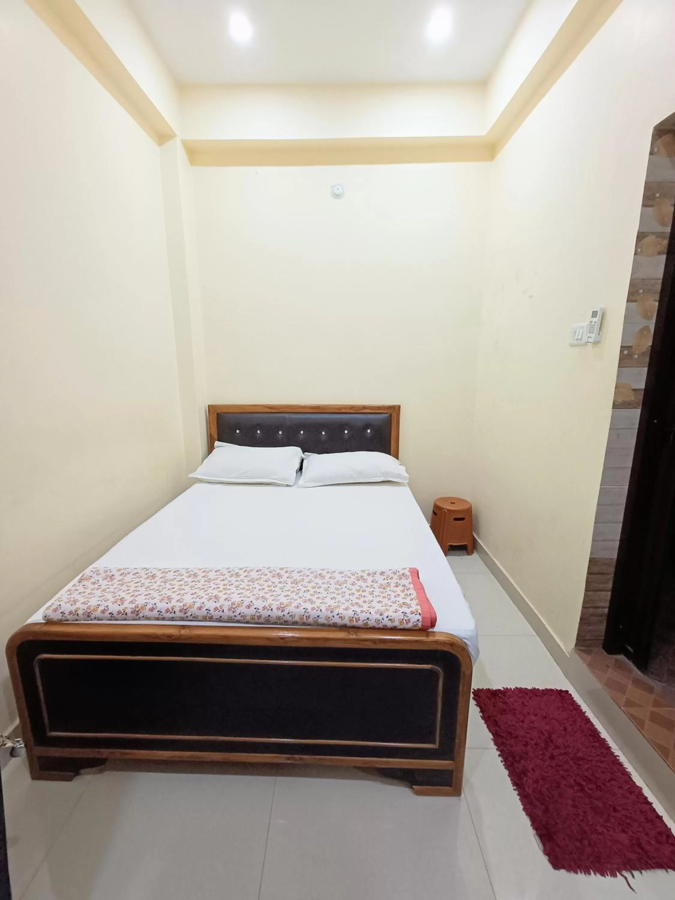 Bed in Hotel Saraswati Palace