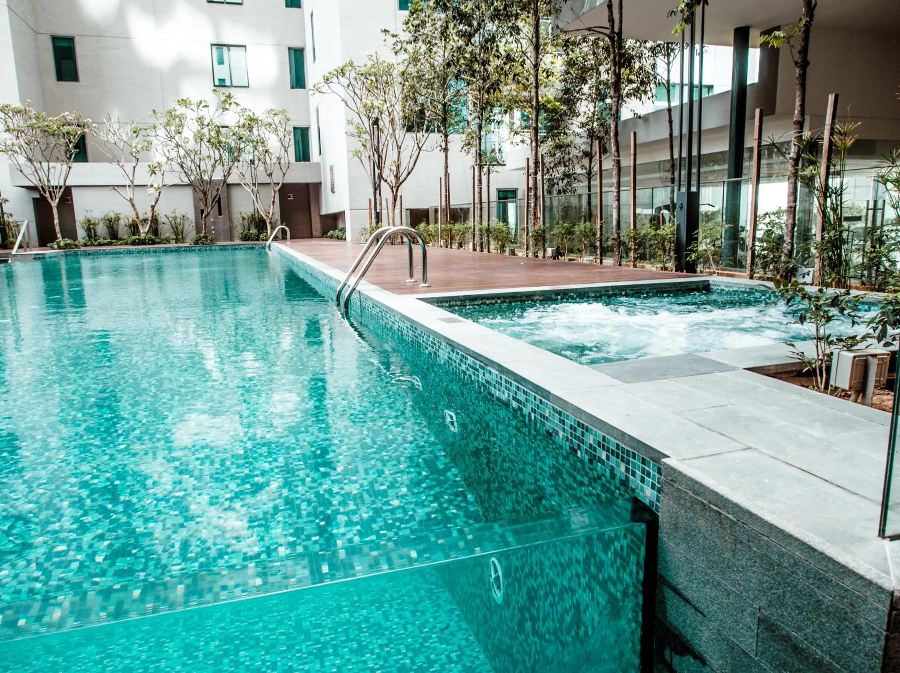 Swimming pool in Summer Suites Residences by Subhome