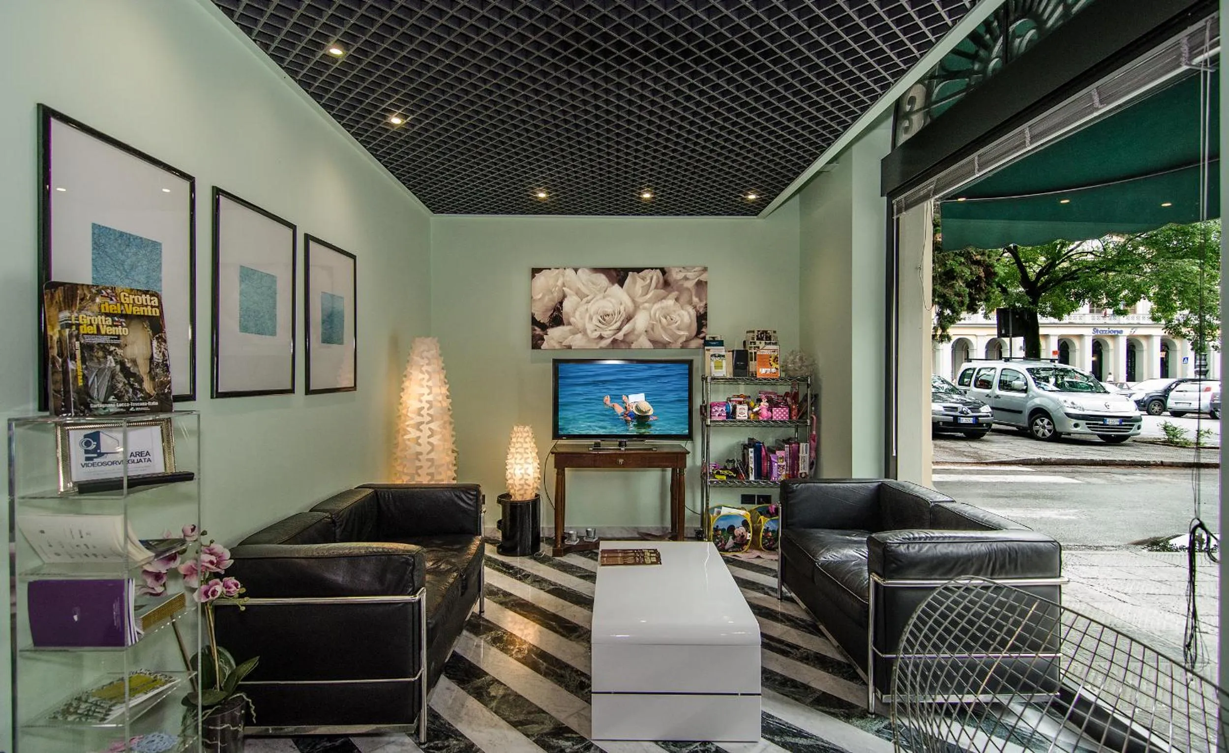 Communal lounge/ TV room in Hotel Rex