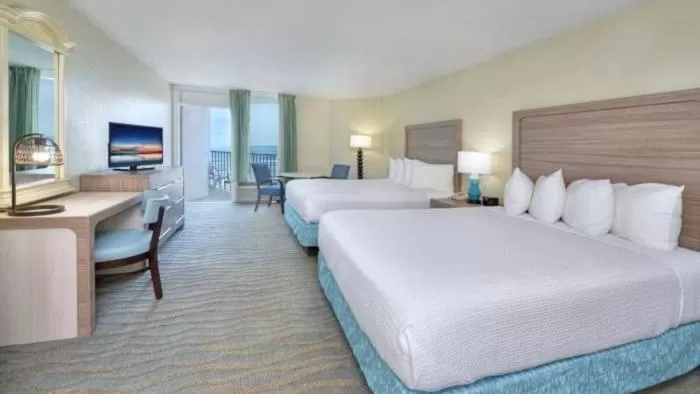 Bed in El Caribe Resort and Conference Center