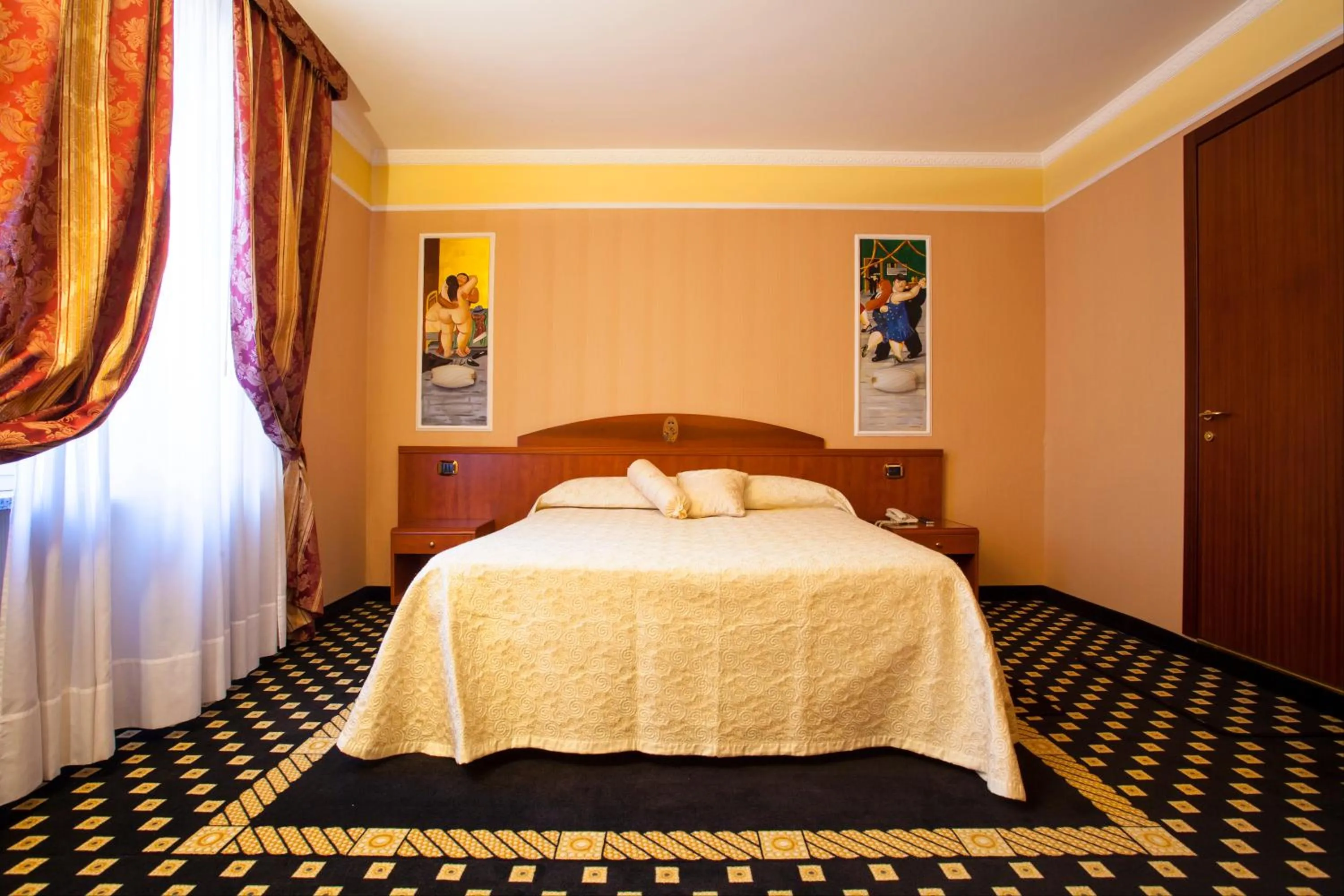 Bed in Boutique Hotel Puccini