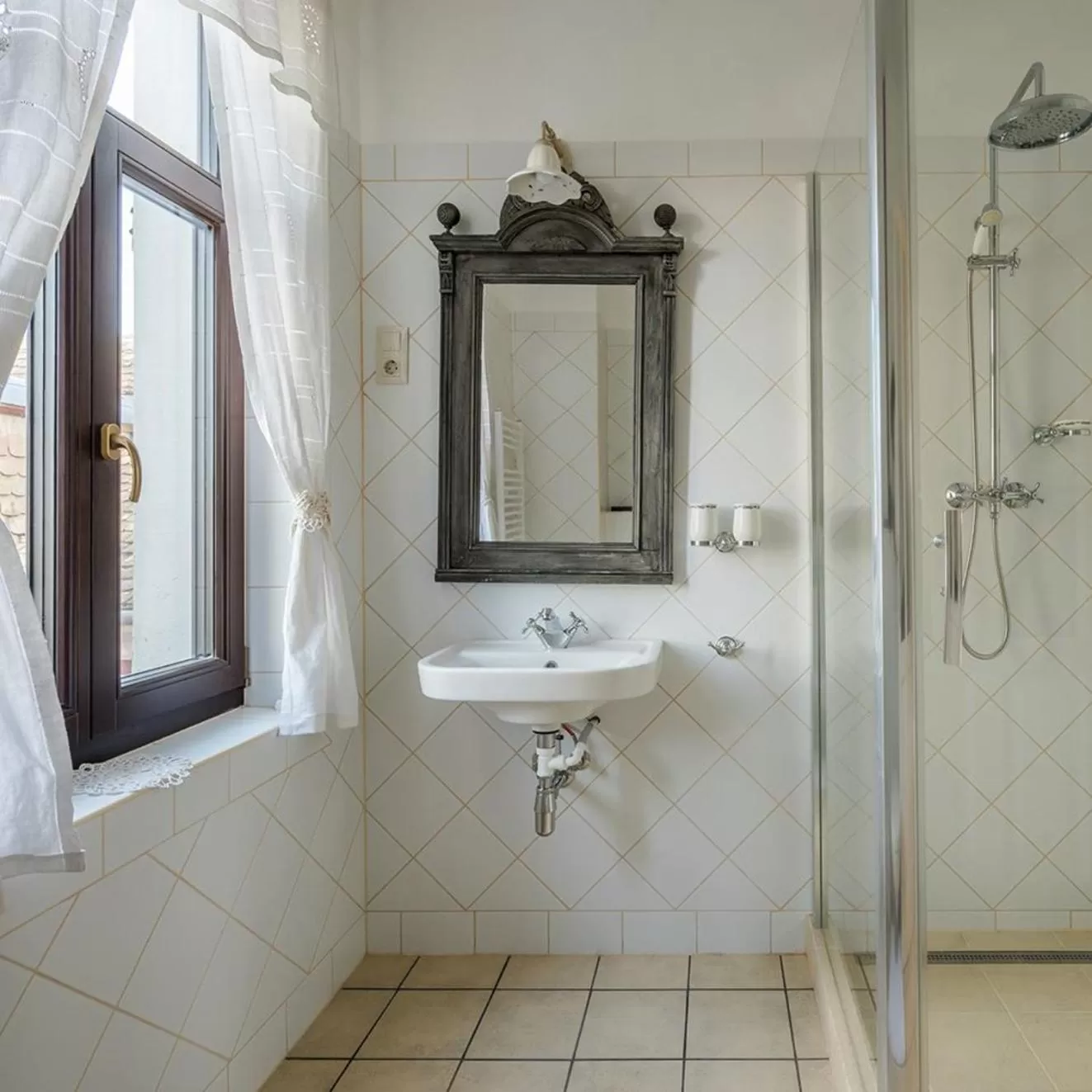 Bathroom in Tenkes Fogadó és Vendégház Harkány