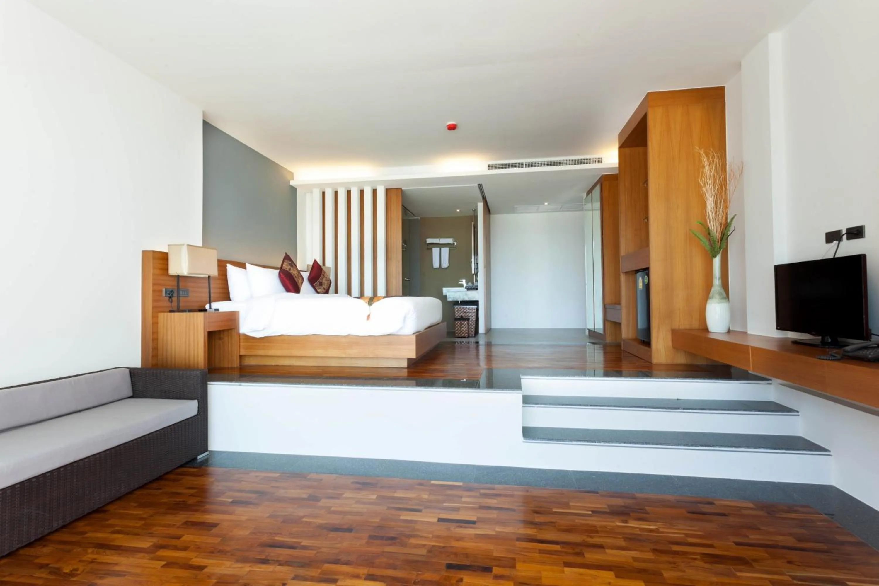 Bed in Chalong Chalet Resort