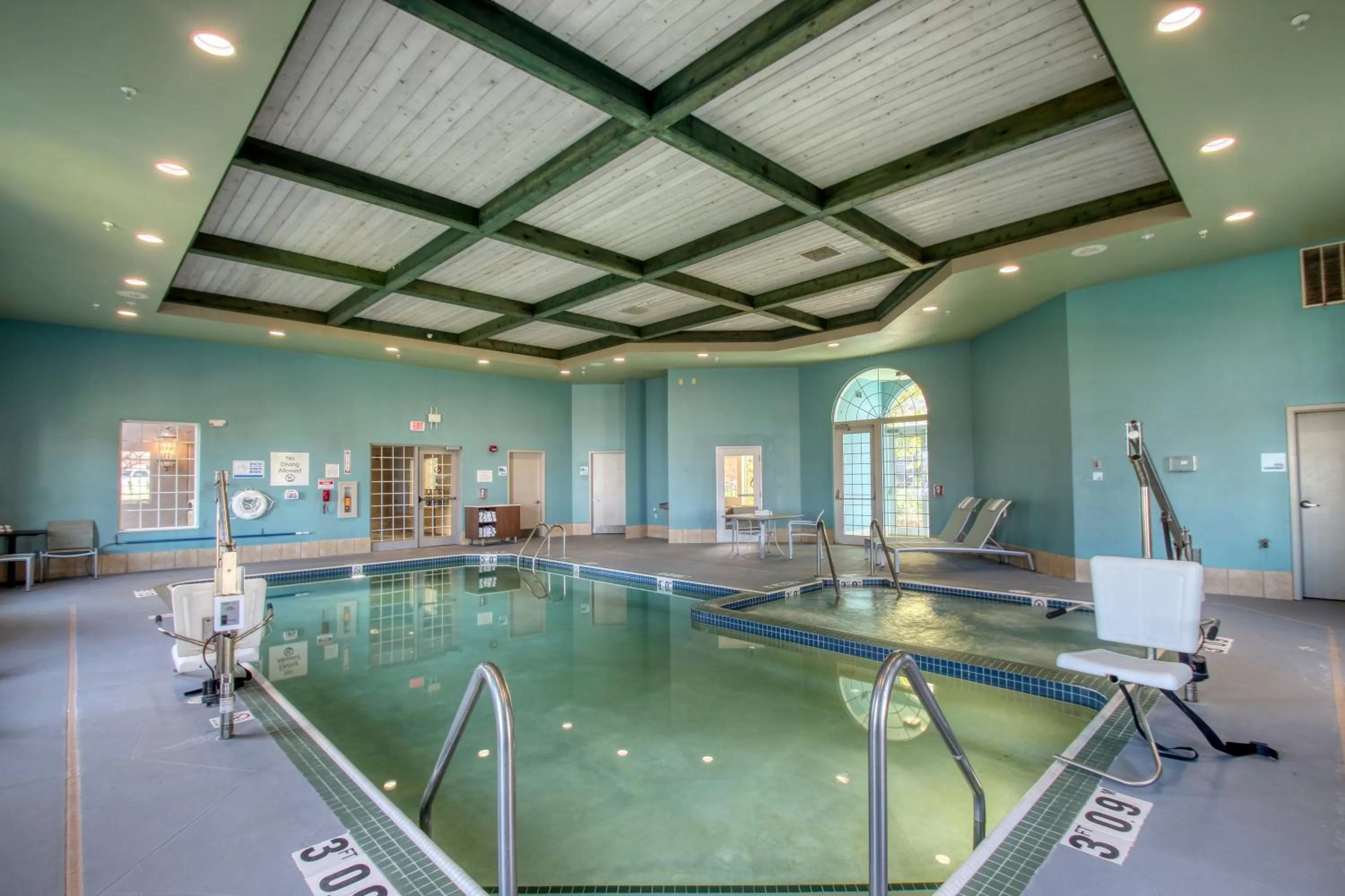 Swimming pool in Holiday Inn Express Hotel & Suites Oshkosh - State Route 41 by IHG