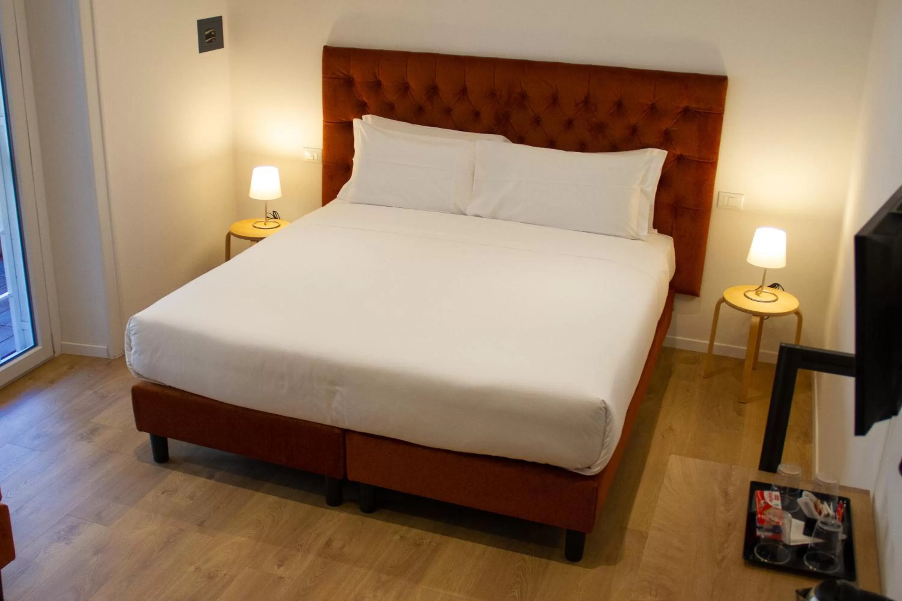 Bed in Michelangelo Vatican Rooms