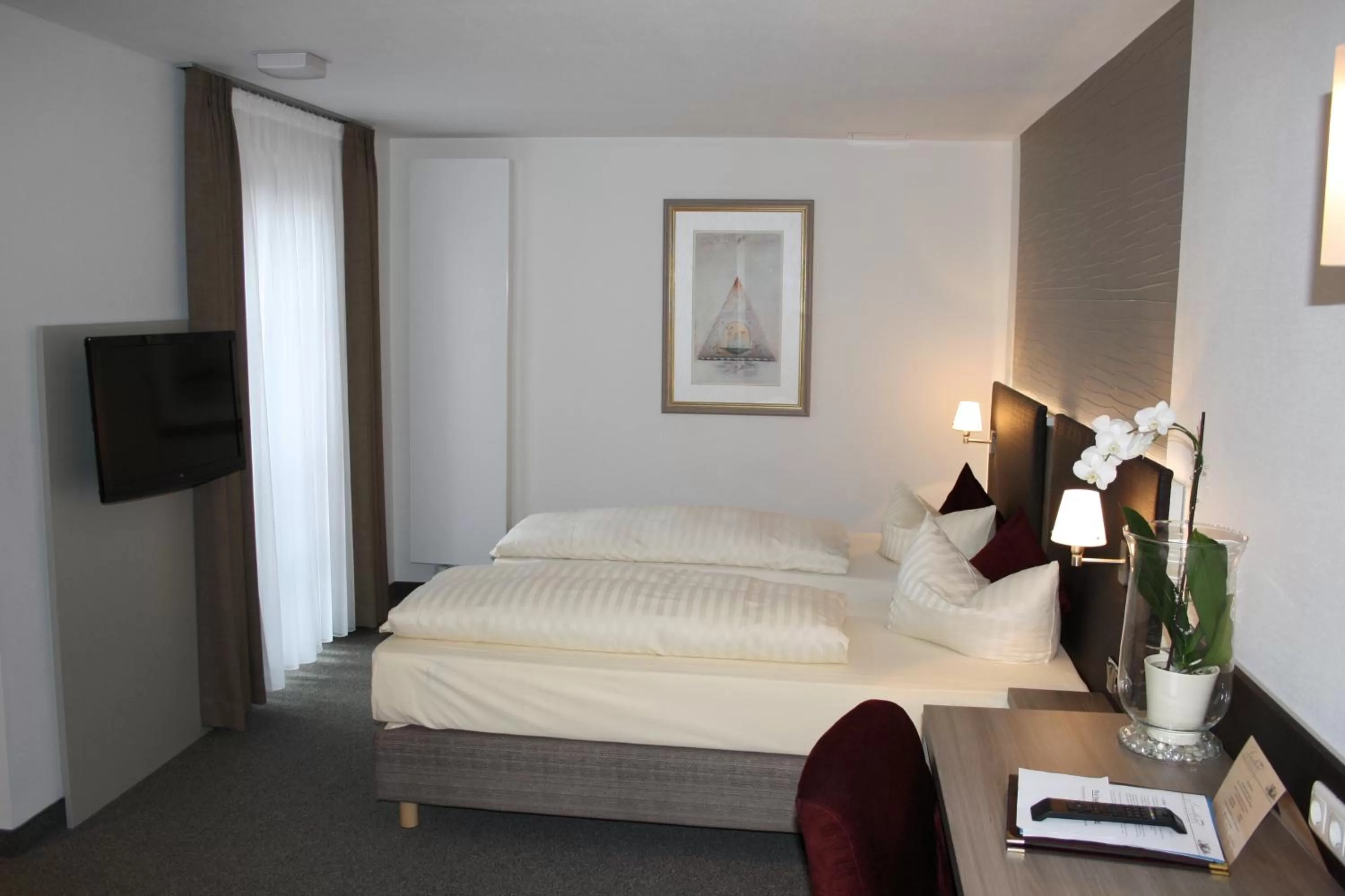 Photo of the whole room, Bed in Landhotel Geiselwind