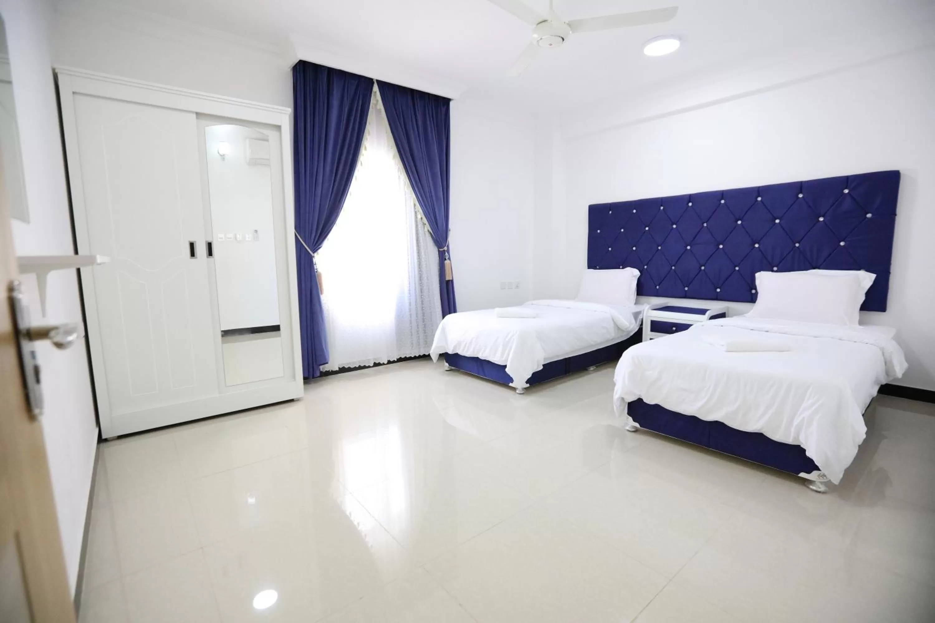 Bed in Al Rayyan Hotel Apartments Muscat