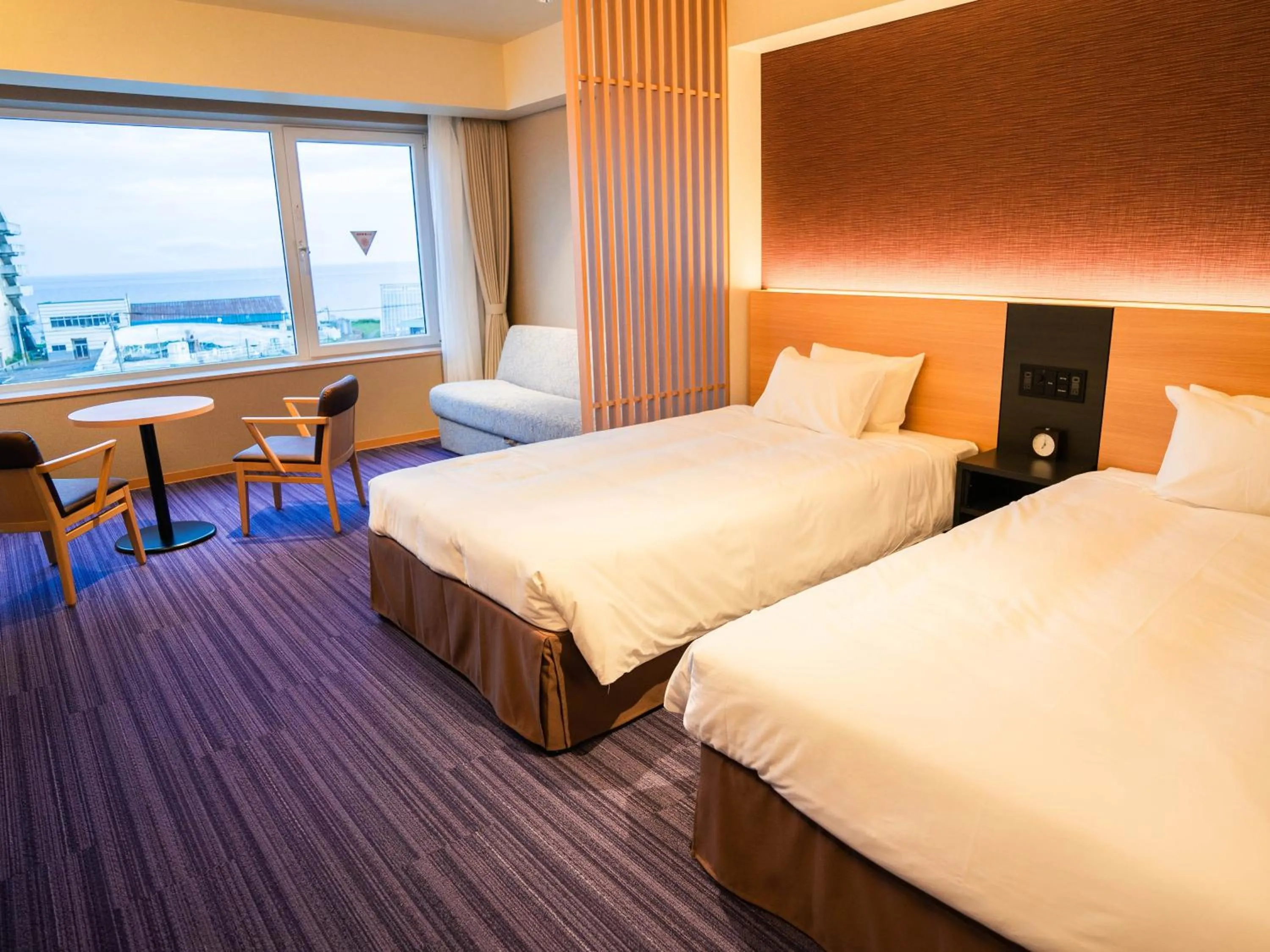 Bed in Hakodate Yunokawa Onsen Umi to Akari Hewitt Resort