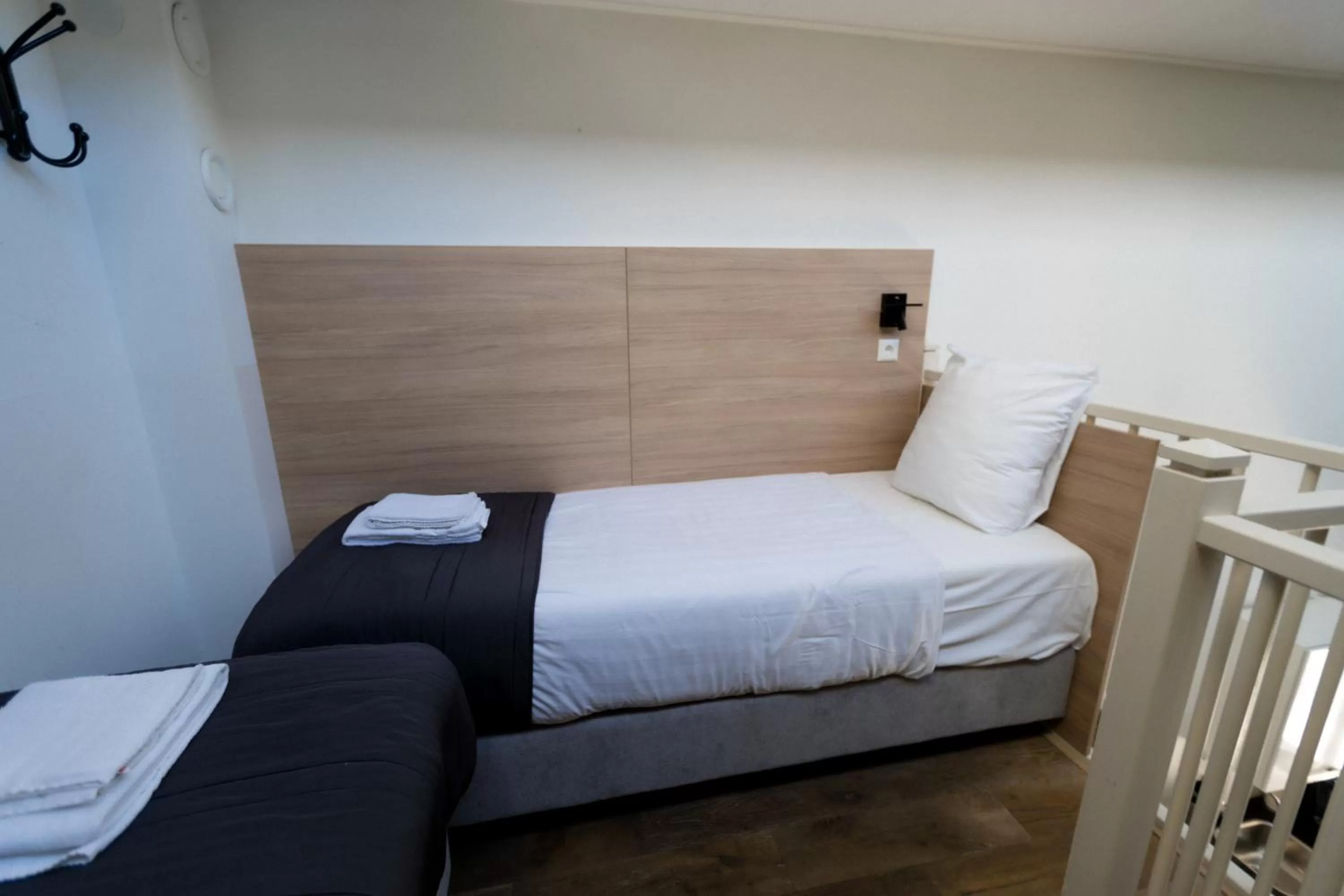 Bed in Plantage Garden Apartments