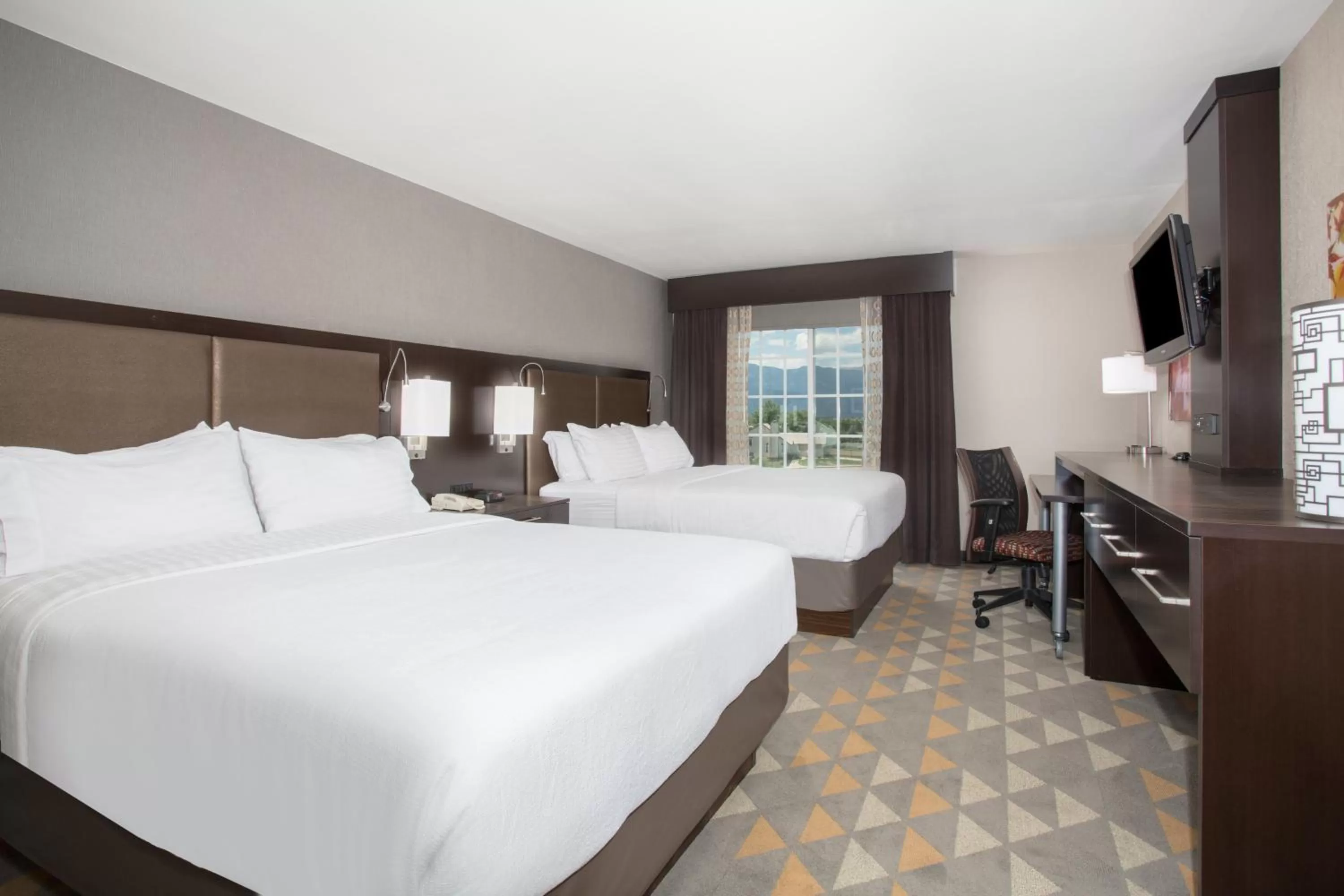 Photo of the whole room, Bed in Holiday Inn Colorado Springs - Airport by IHG