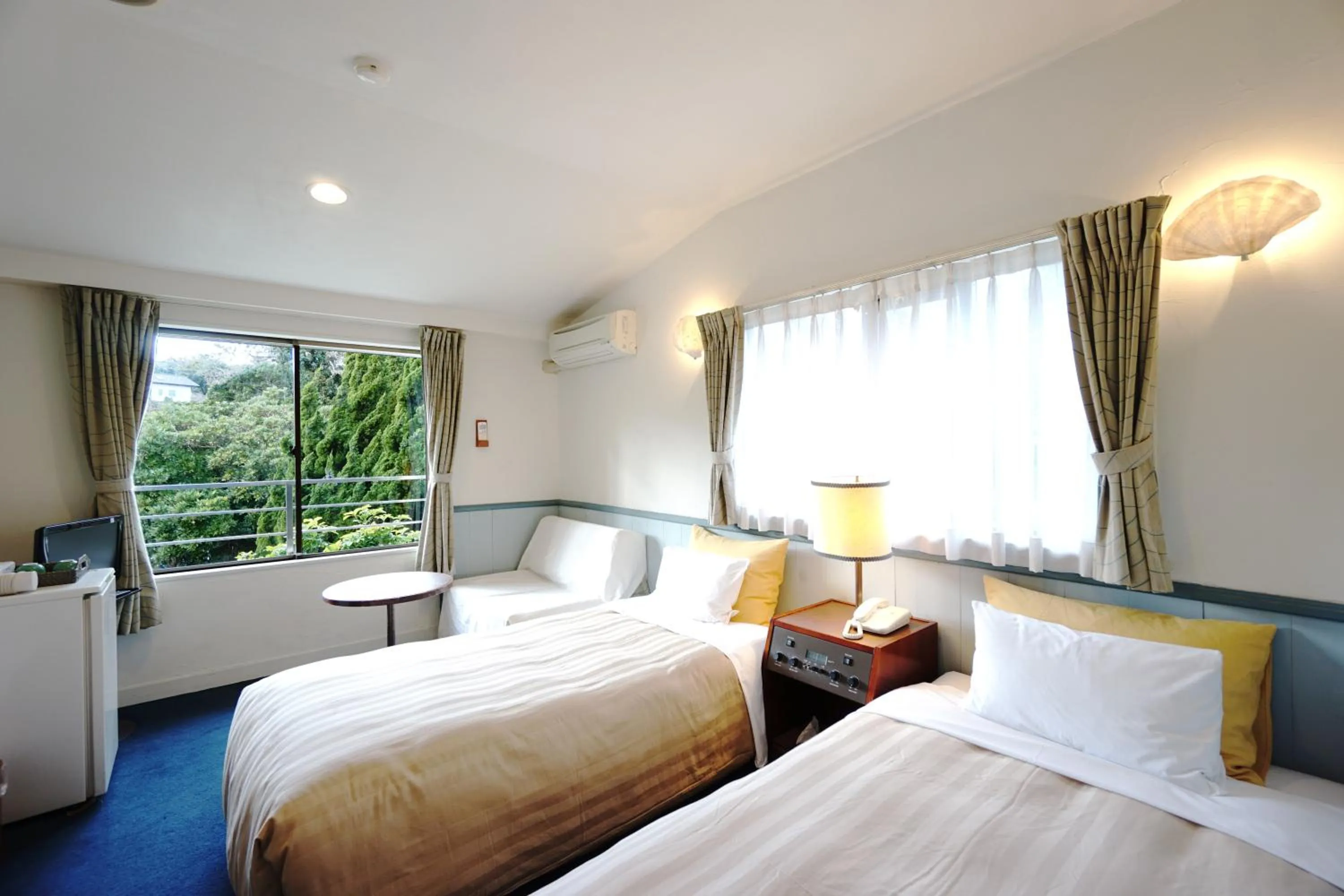 Bed in Gardenvilla Shirahama