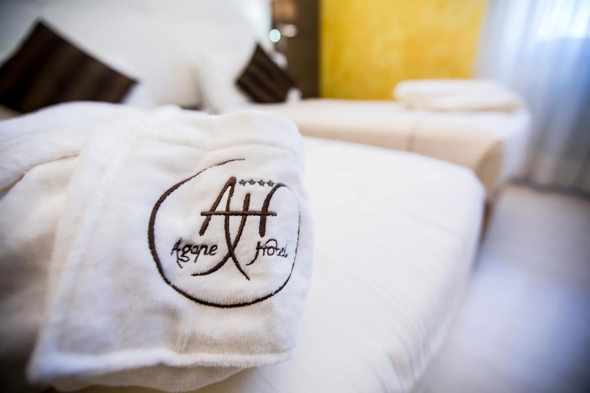Logo/Certificate/Sign, Bed in Agape Hotel AA Hotels