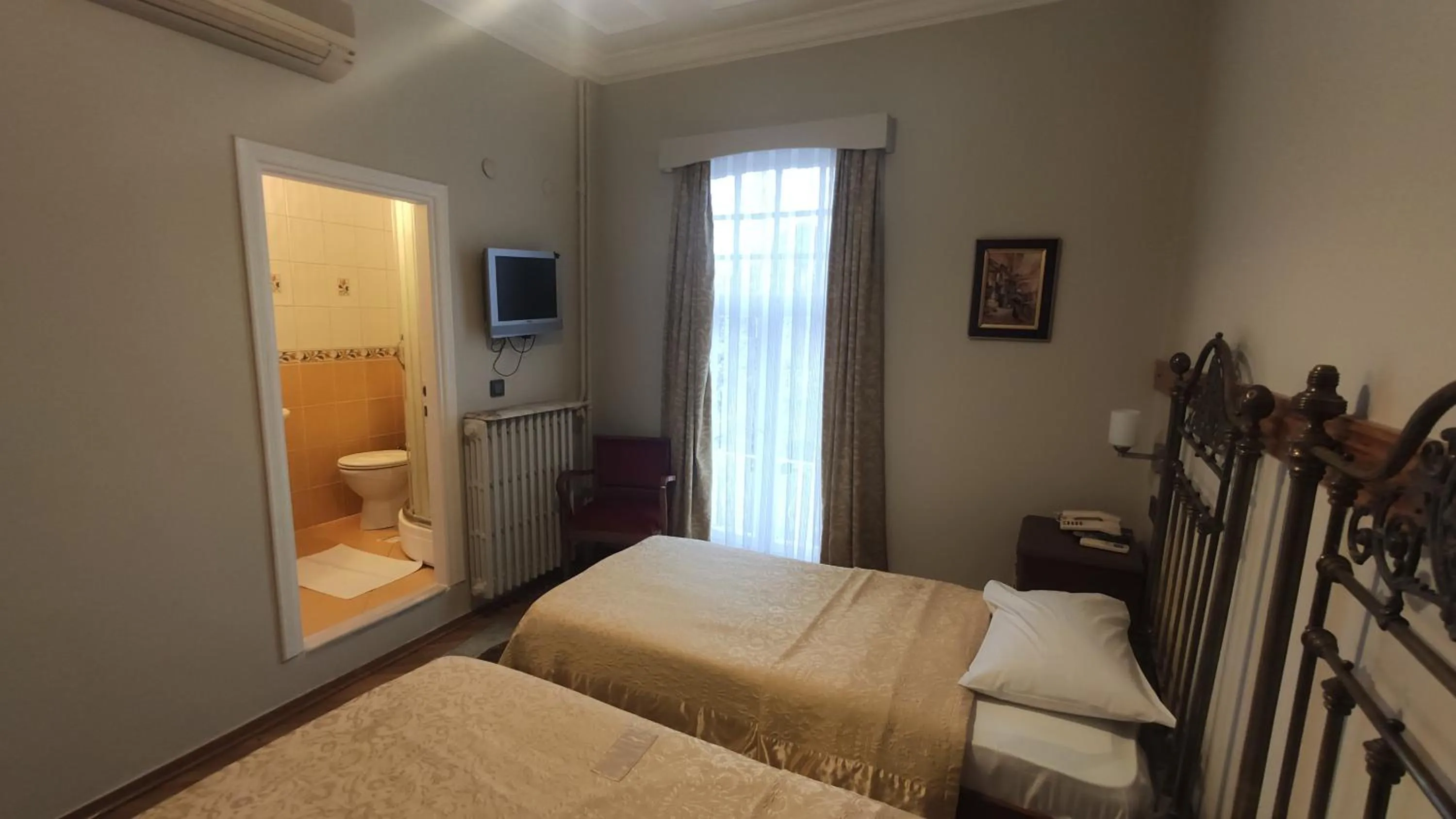 Bed in Turkoman Hotel