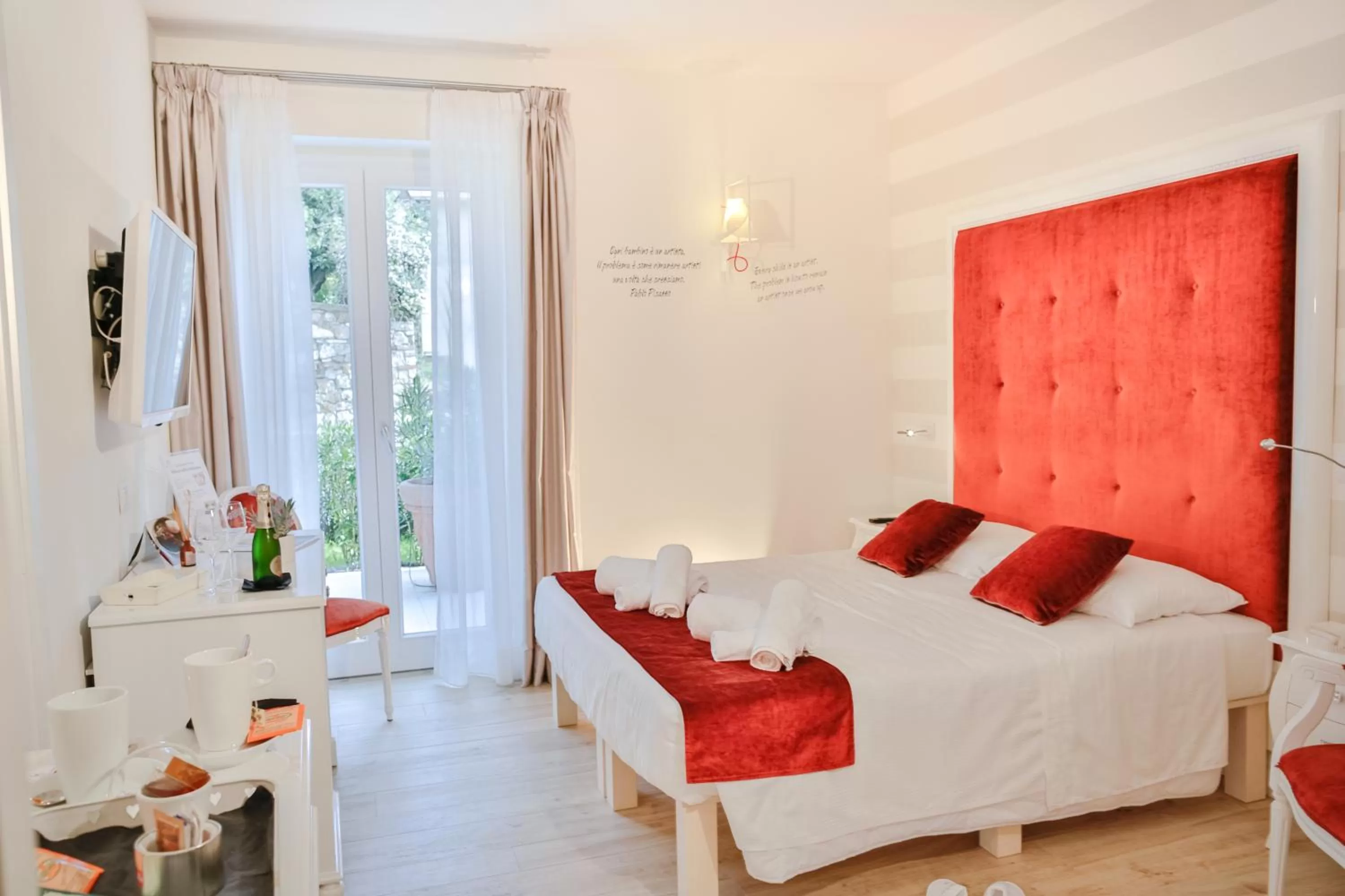 Photo of the whole room, Bed in VILLA LIBERTY Boutique Hotel - Borgo Capitano Collection