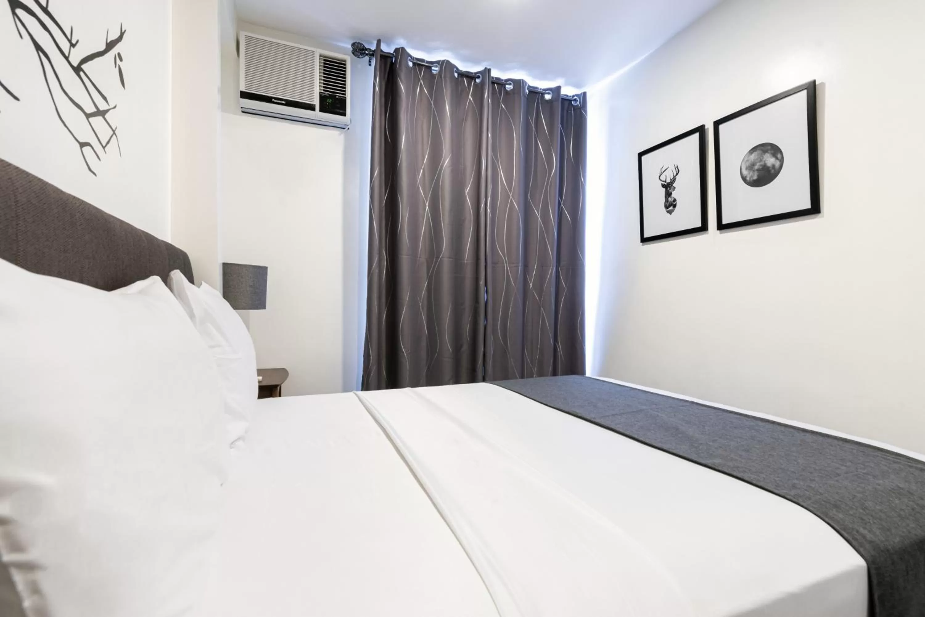 Bedroom, Bed in Artemis Place Makati Hotel