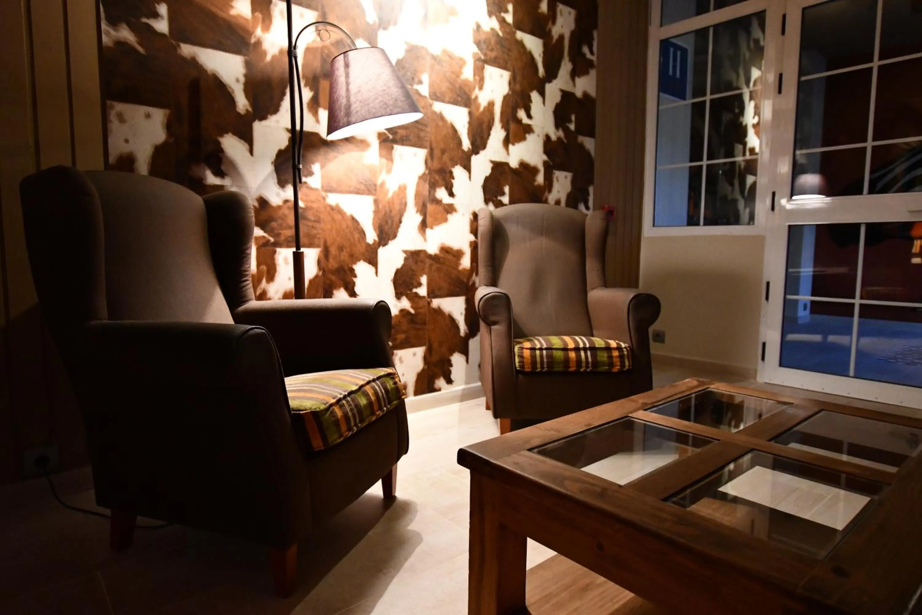 Communal lounge/ TV room in Hotel Oriente