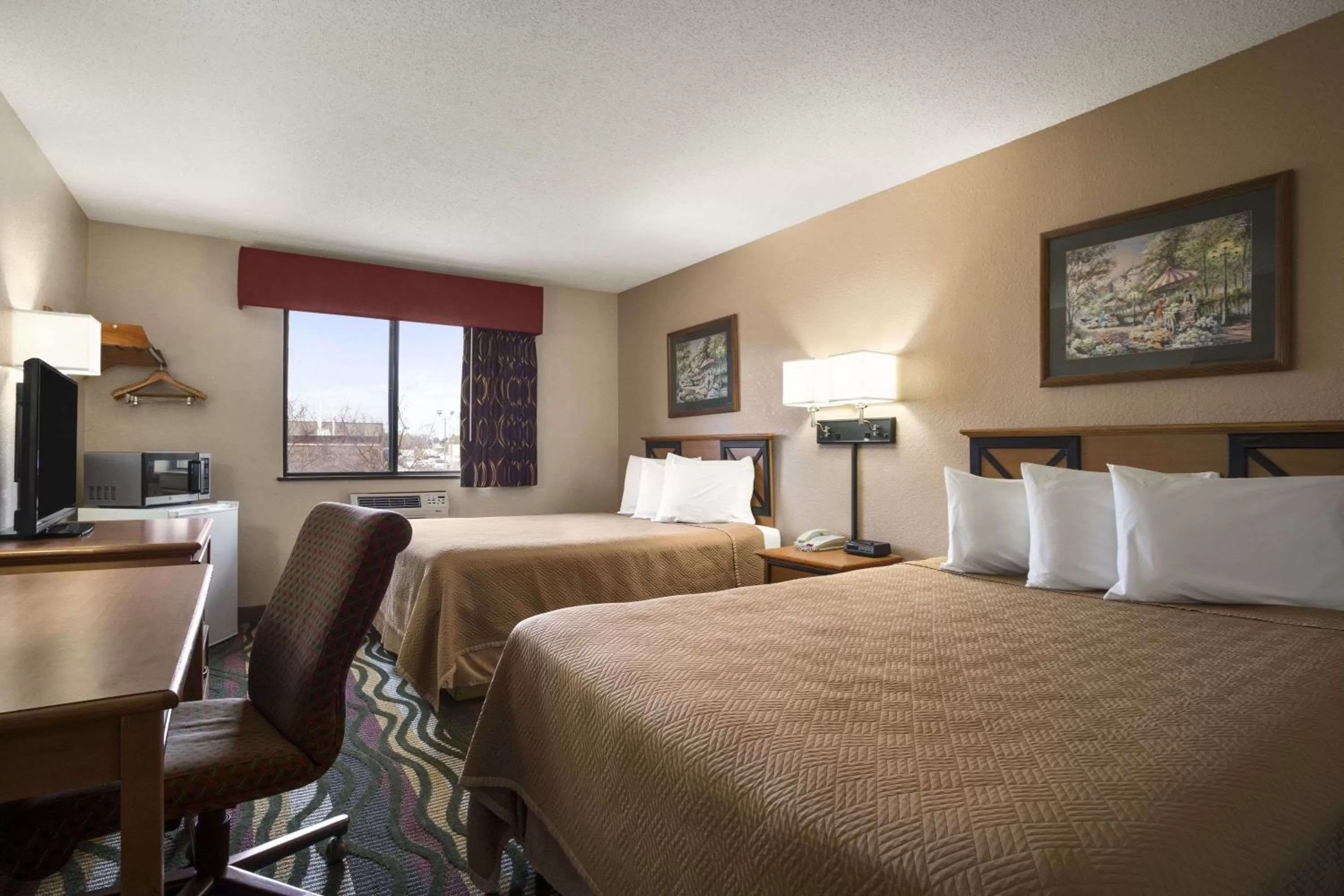 Photo of the whole room, Bed in Travelodge by Wyndham Battle Creek