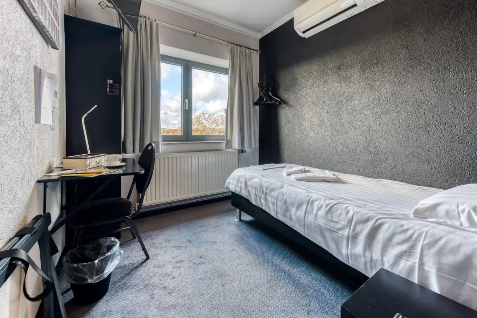 Photo of the whole room, Bed in Hôtel de la Gare