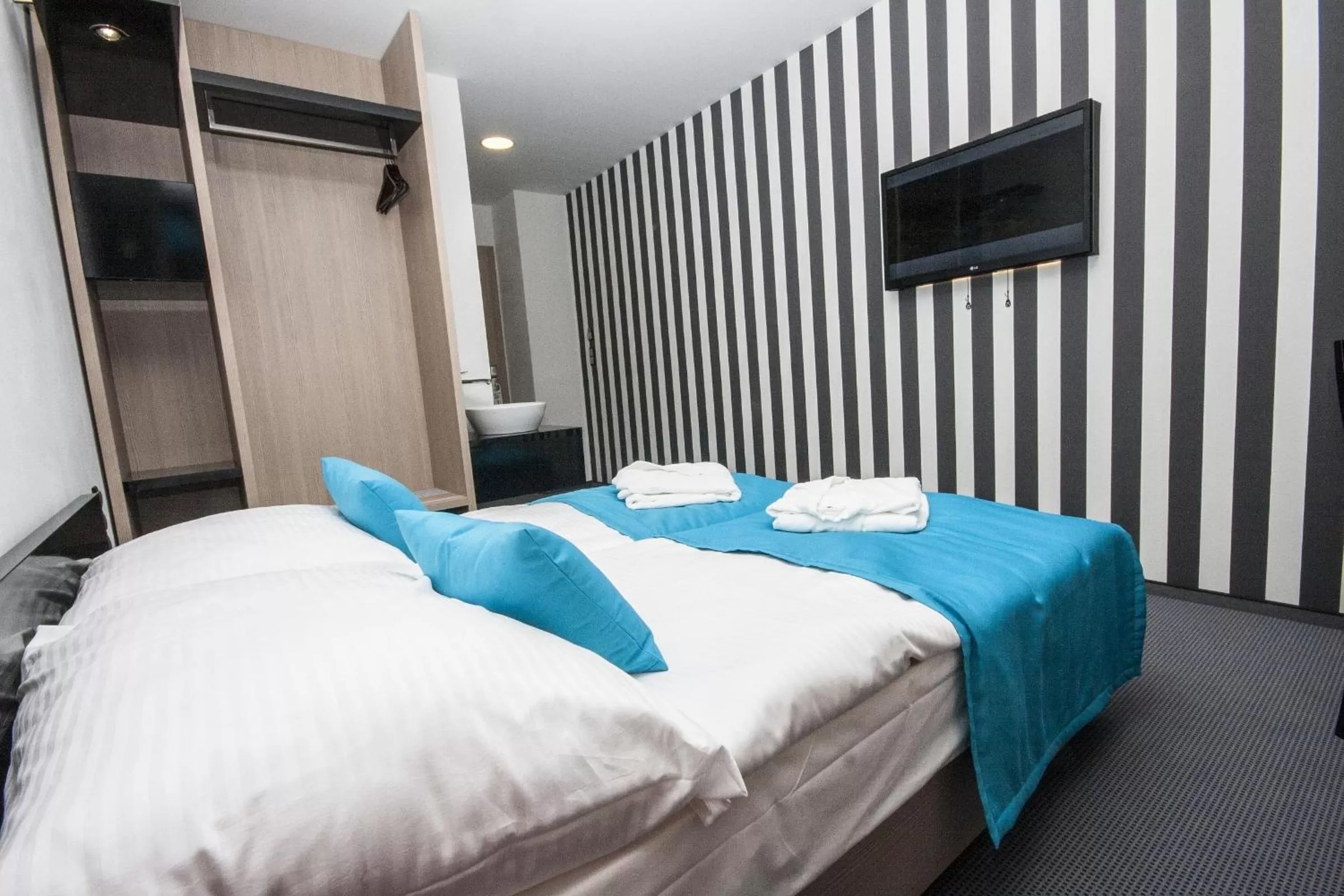 Bed in Hotel AquaCity Riverside