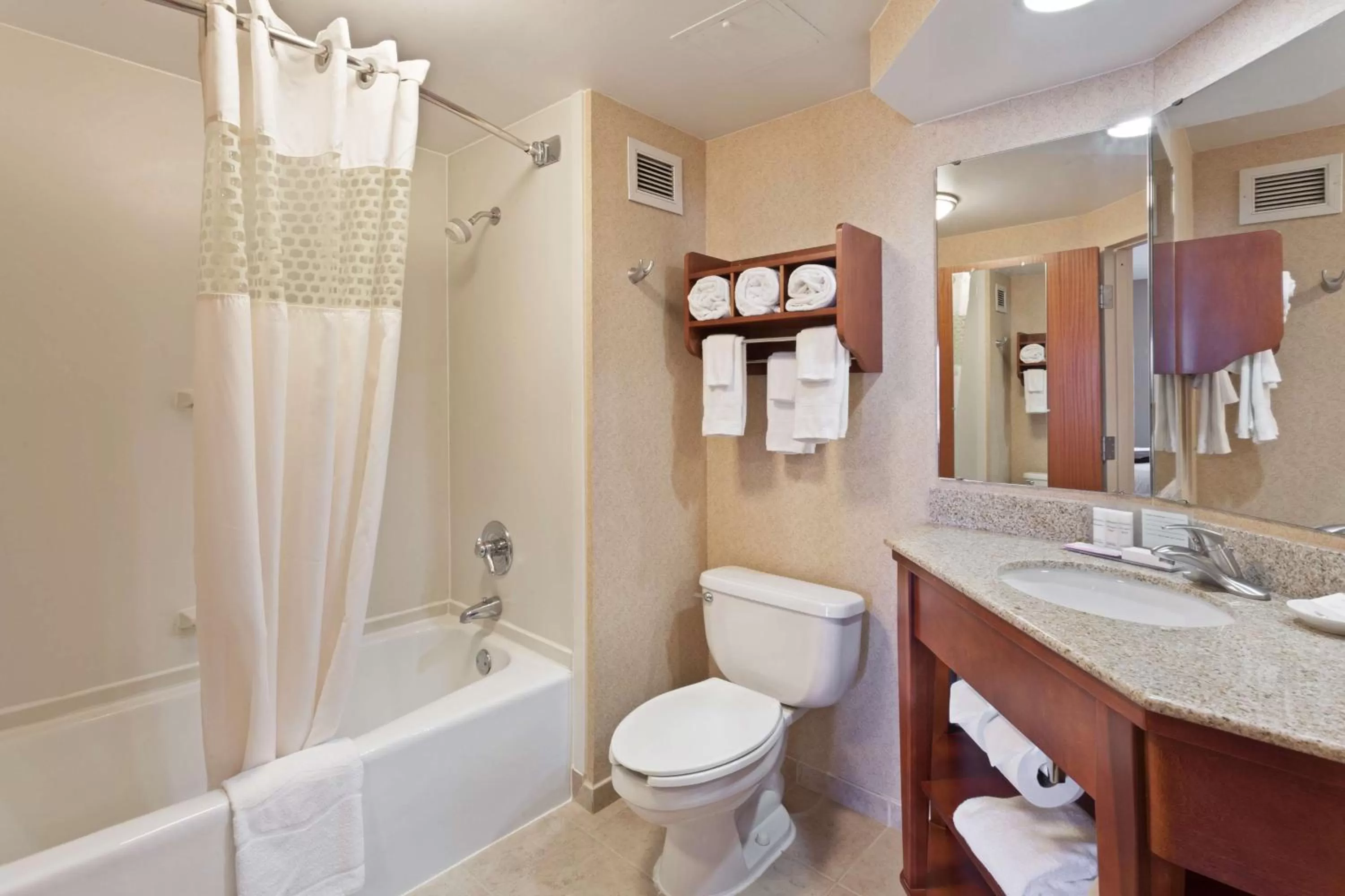 Bed, Bathroom in Hampton Inn Joplin