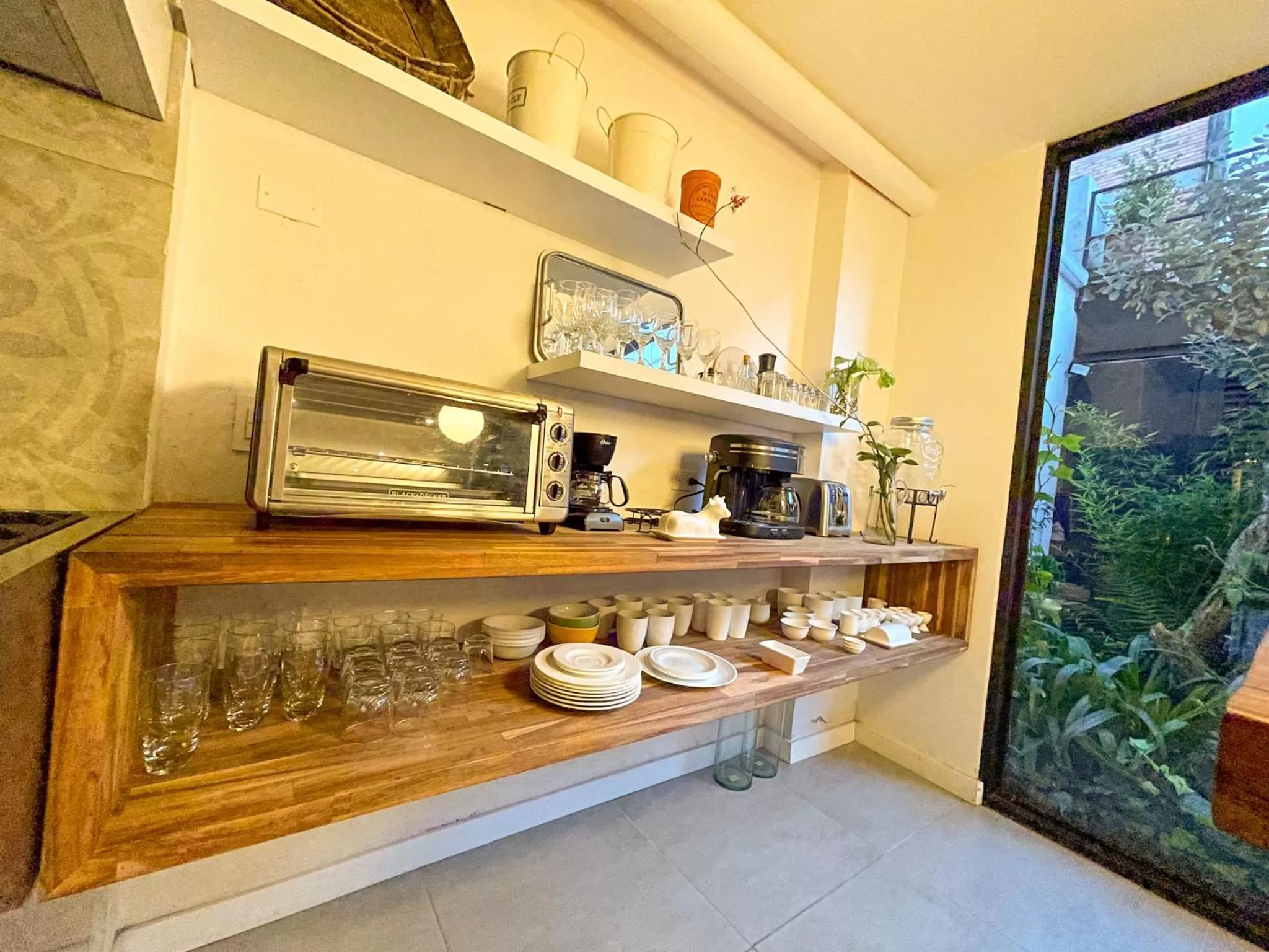Communal kitchen in Lucitania Hotel Boutique
