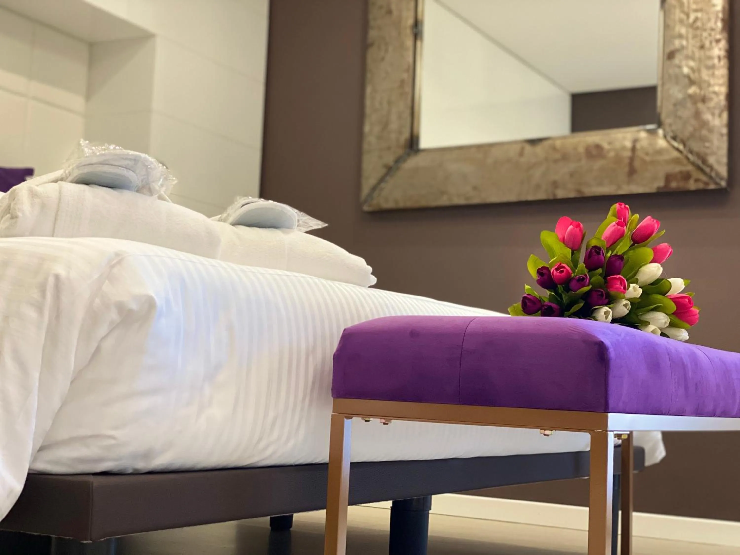 Bed in Gran Paradiso Hotel Spa