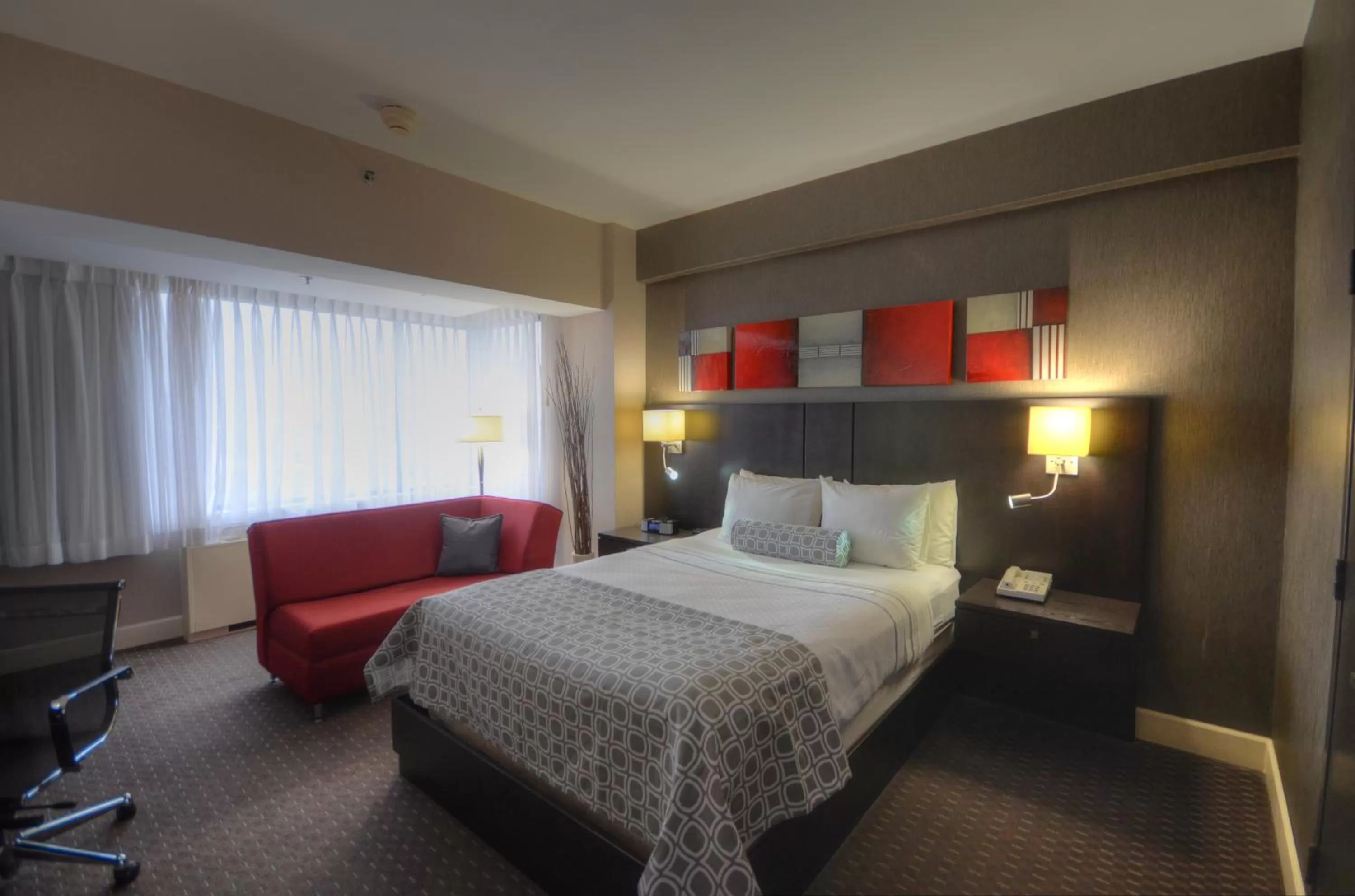 Bed in Armon Plaza Montreal Airpt, Trademark Collection by Wyndham