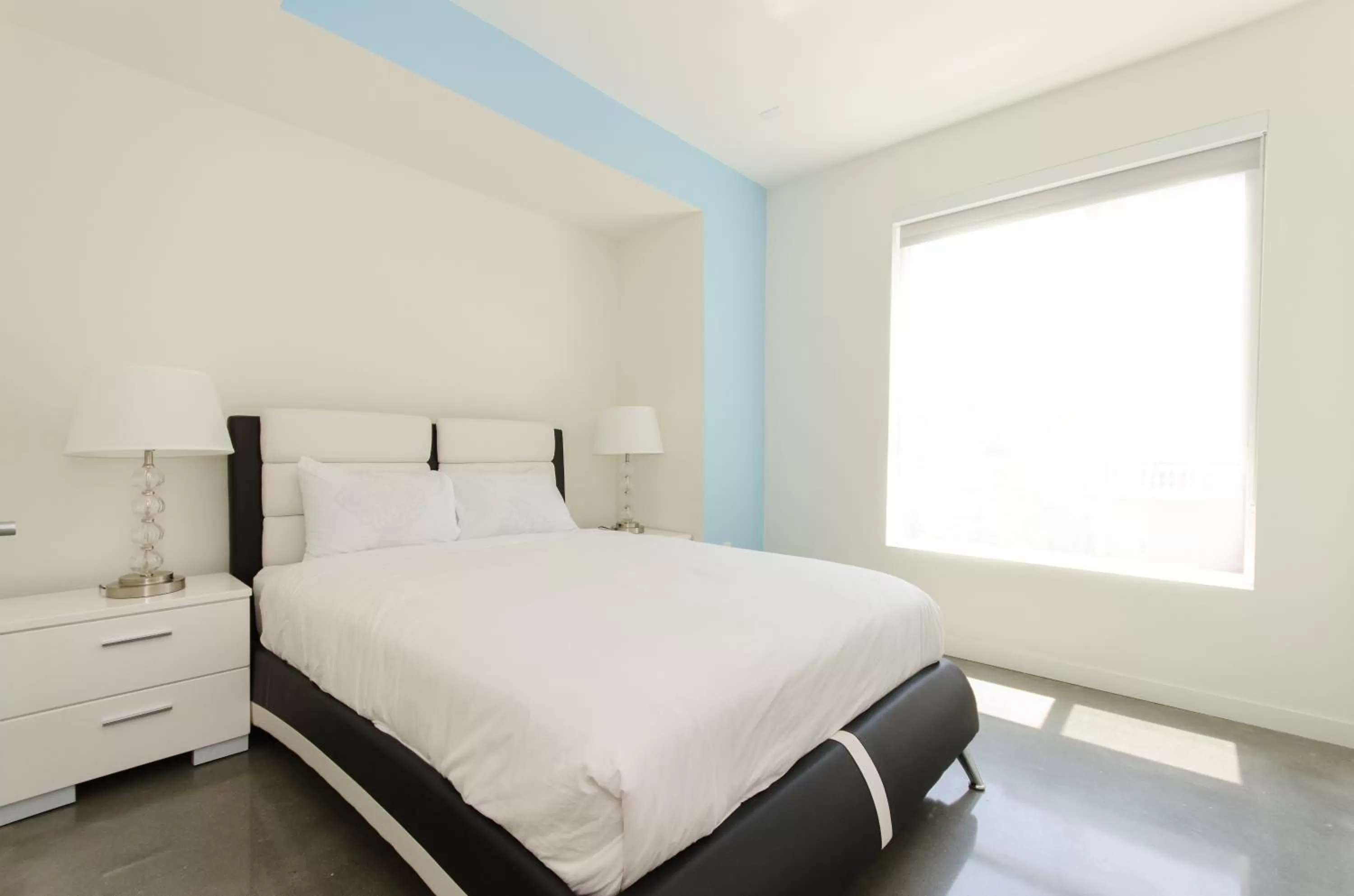 Bed in Modern Apartment Rentals