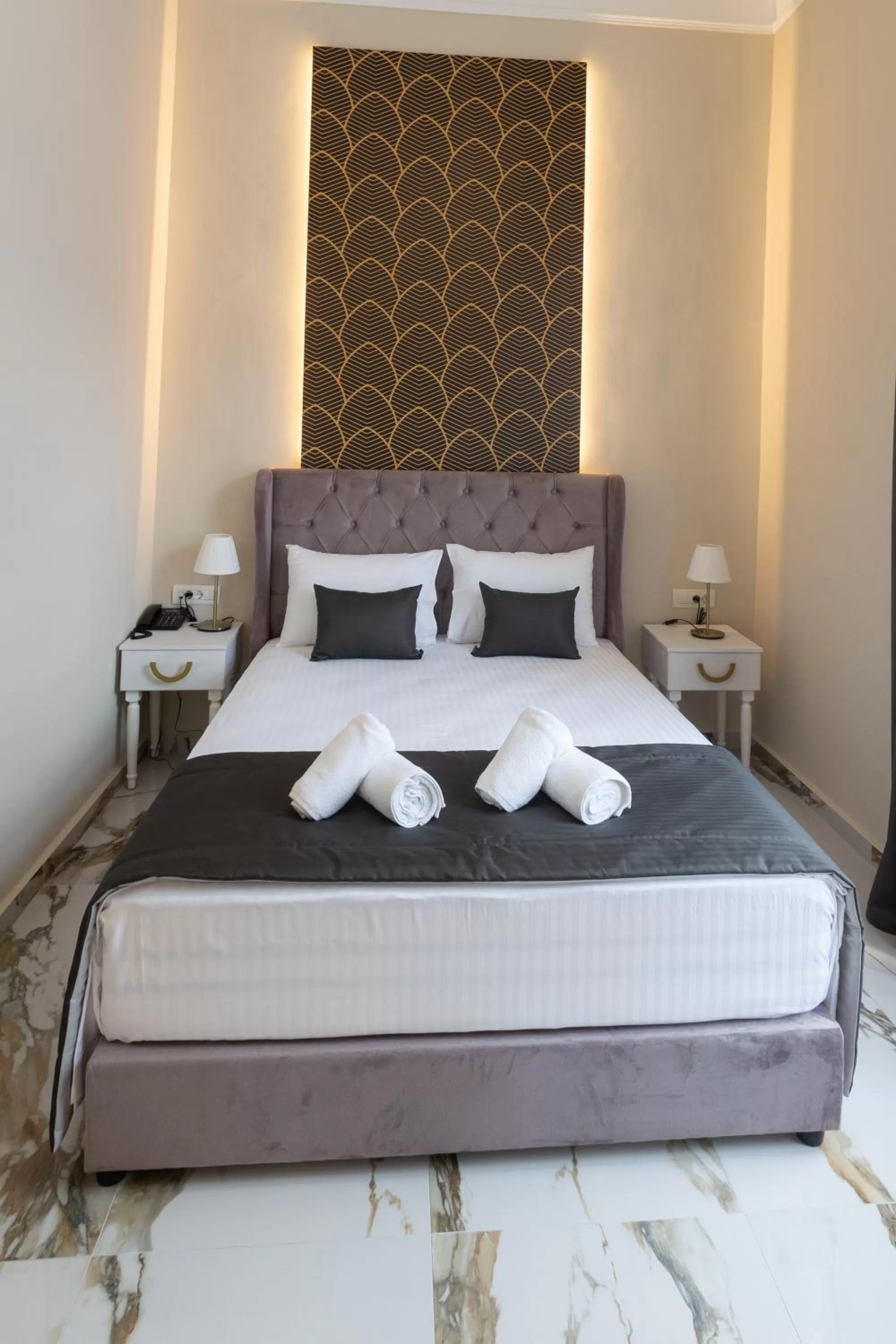 Bed in Modern Revival Luxury Hotel