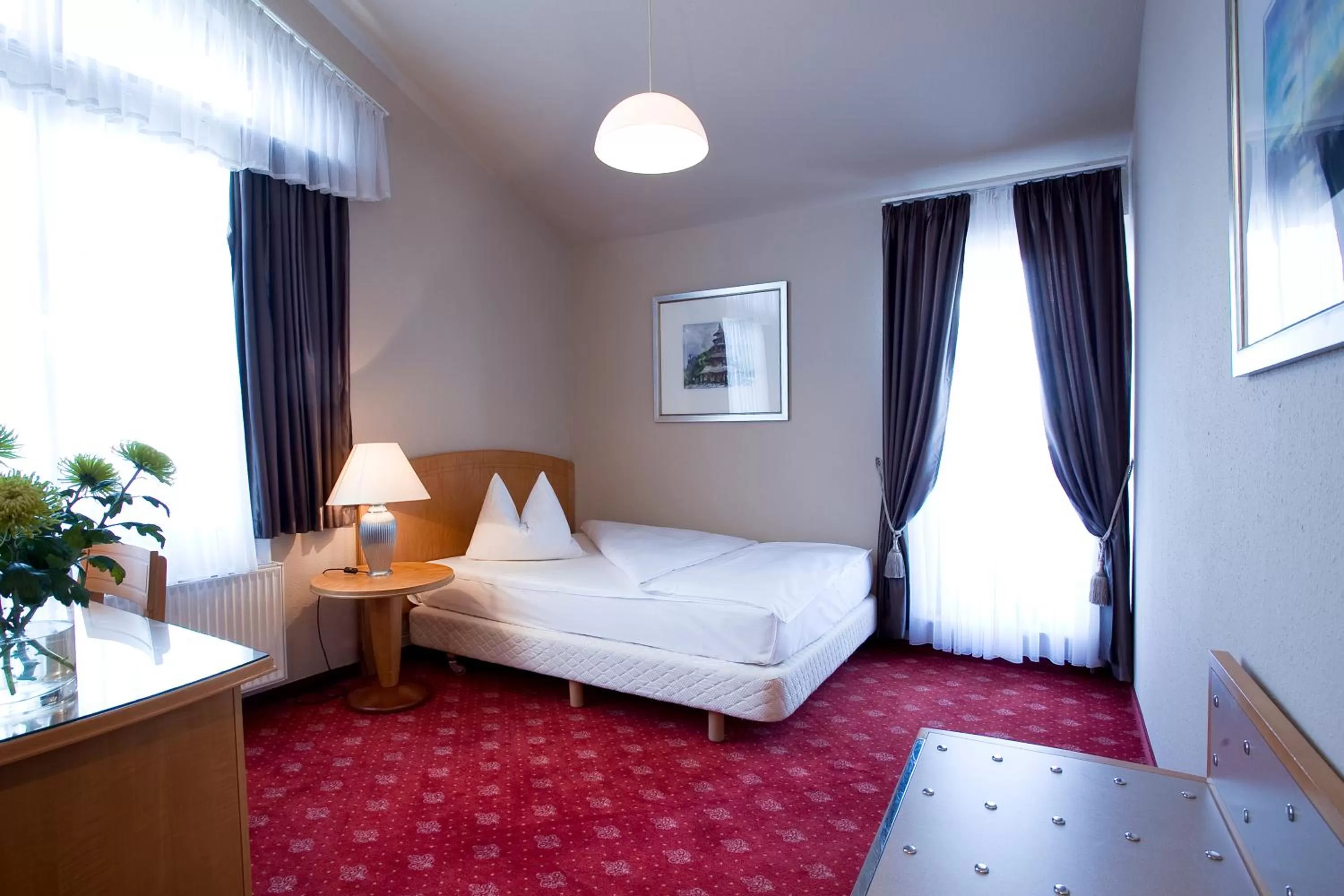 Bed in Hotel Das Kleine Ritz