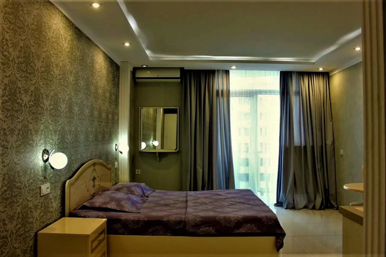 Bed in Orbi Lux Apartment