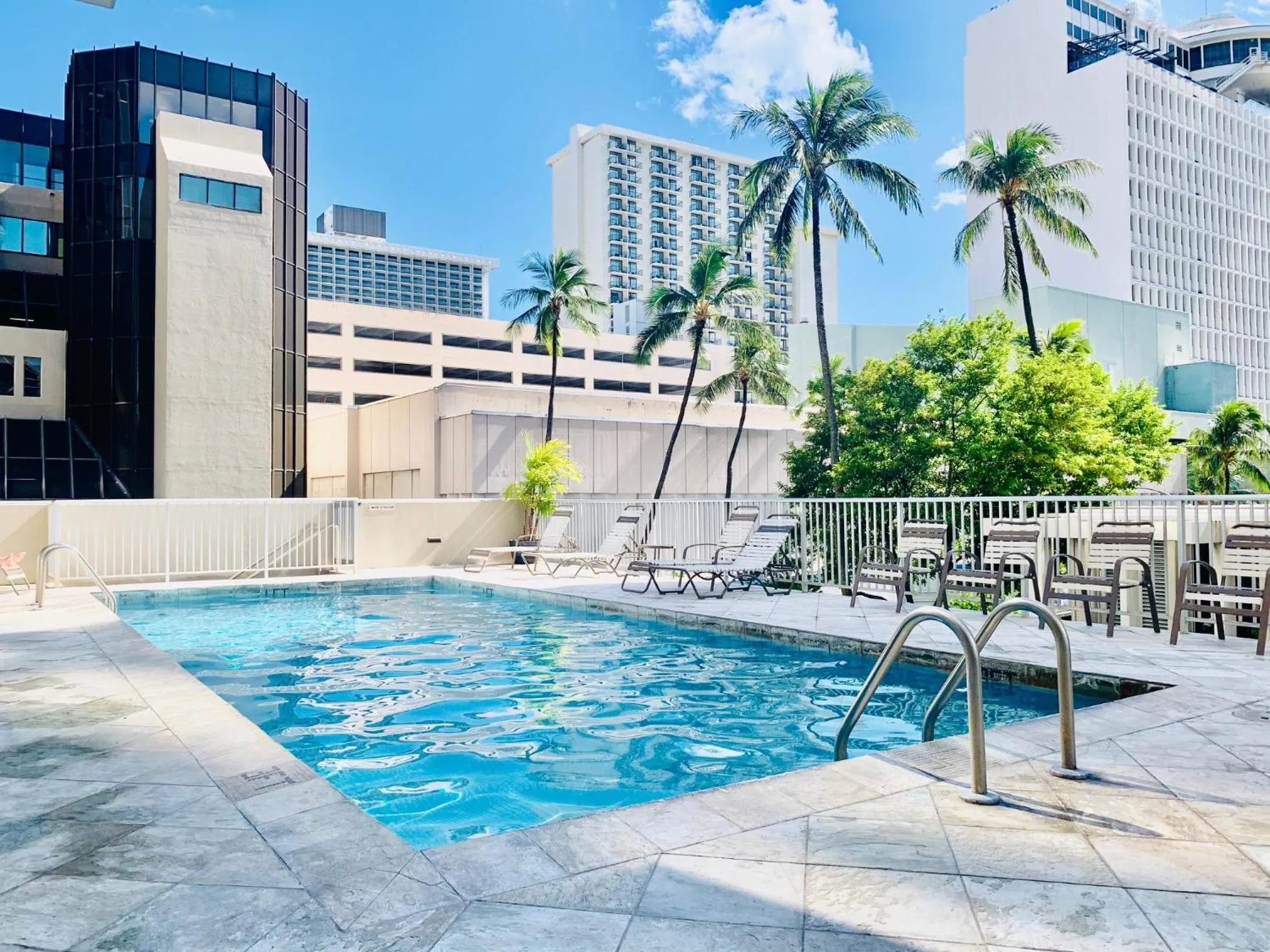Pool view in Tropical Studios at Marine Surf Waikiki - FREE PARKING - BEST LOCATION - FULL KITCHEN - SWIMMING POOL
