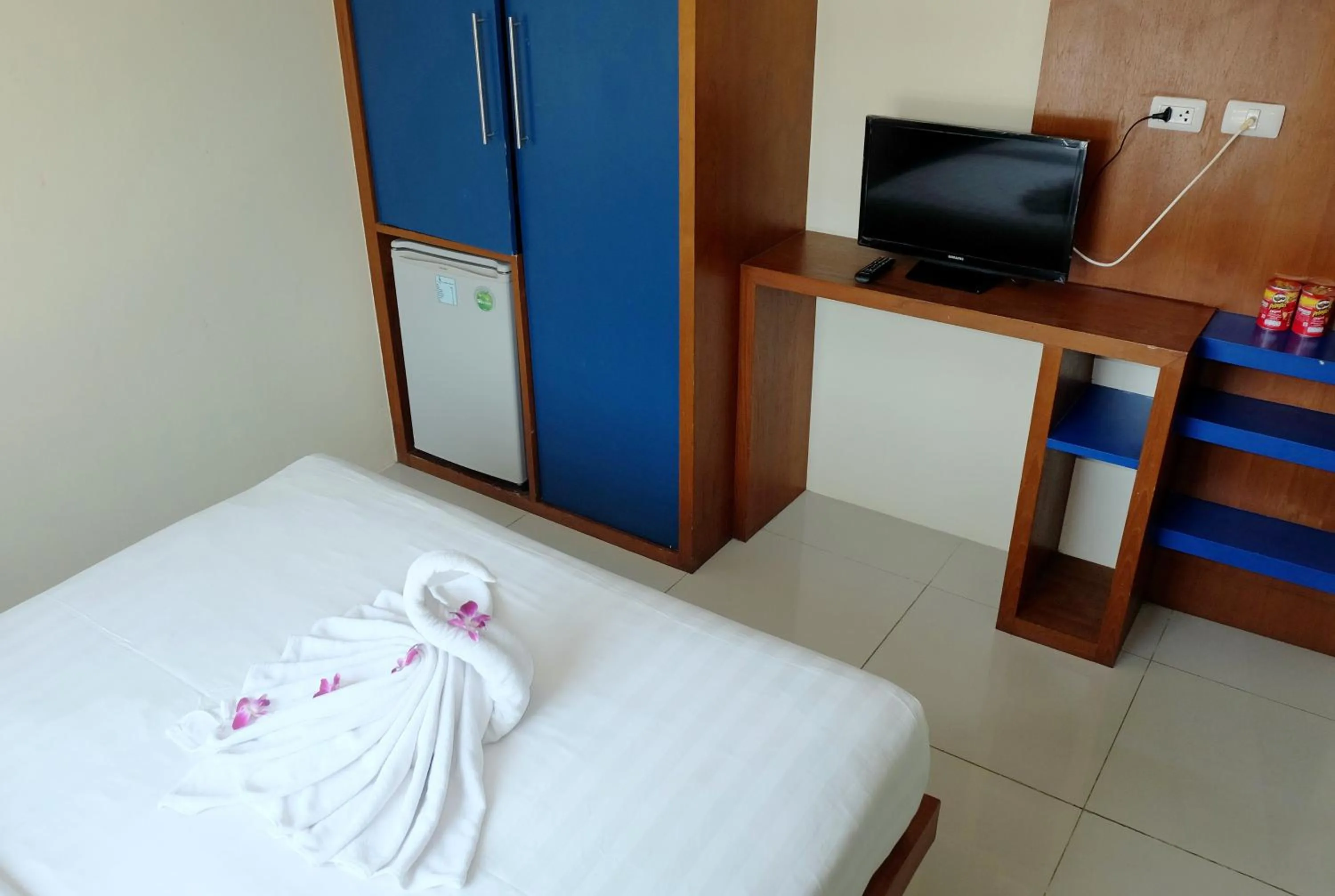 Bed in Calypso Patong Hotel