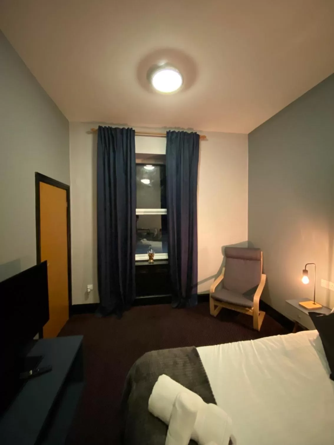 Bed in Bay view rooms at Mentone Hotel