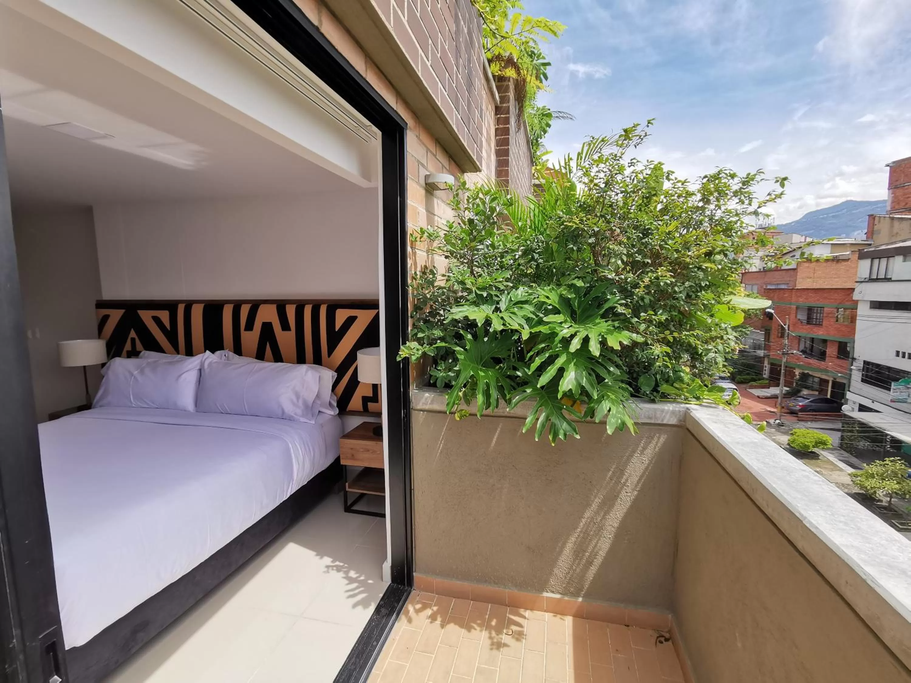 Balcony/Terrace, Bed in Origen Local Suites