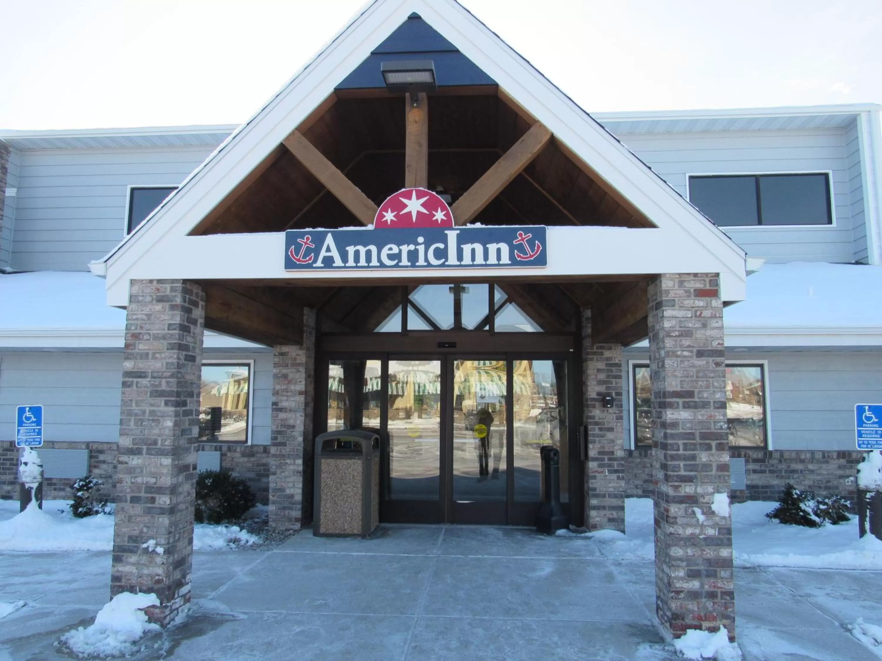 Logo/Certificate/Sign in AmericInn by Wyndham Menominee