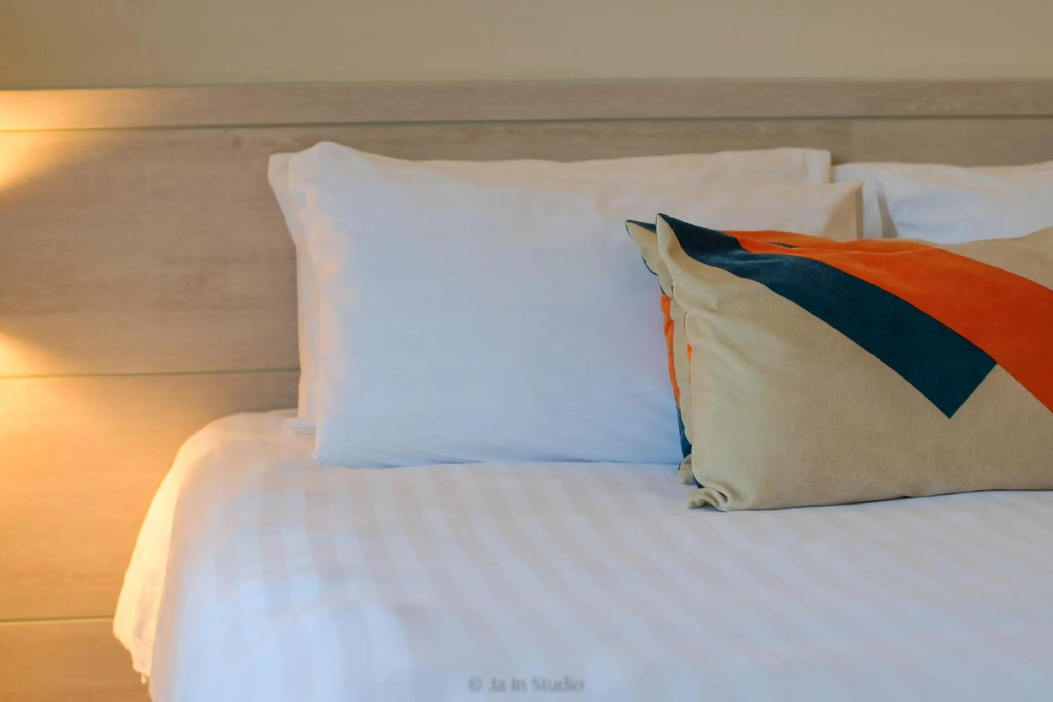 Bed in NornDee Hotel