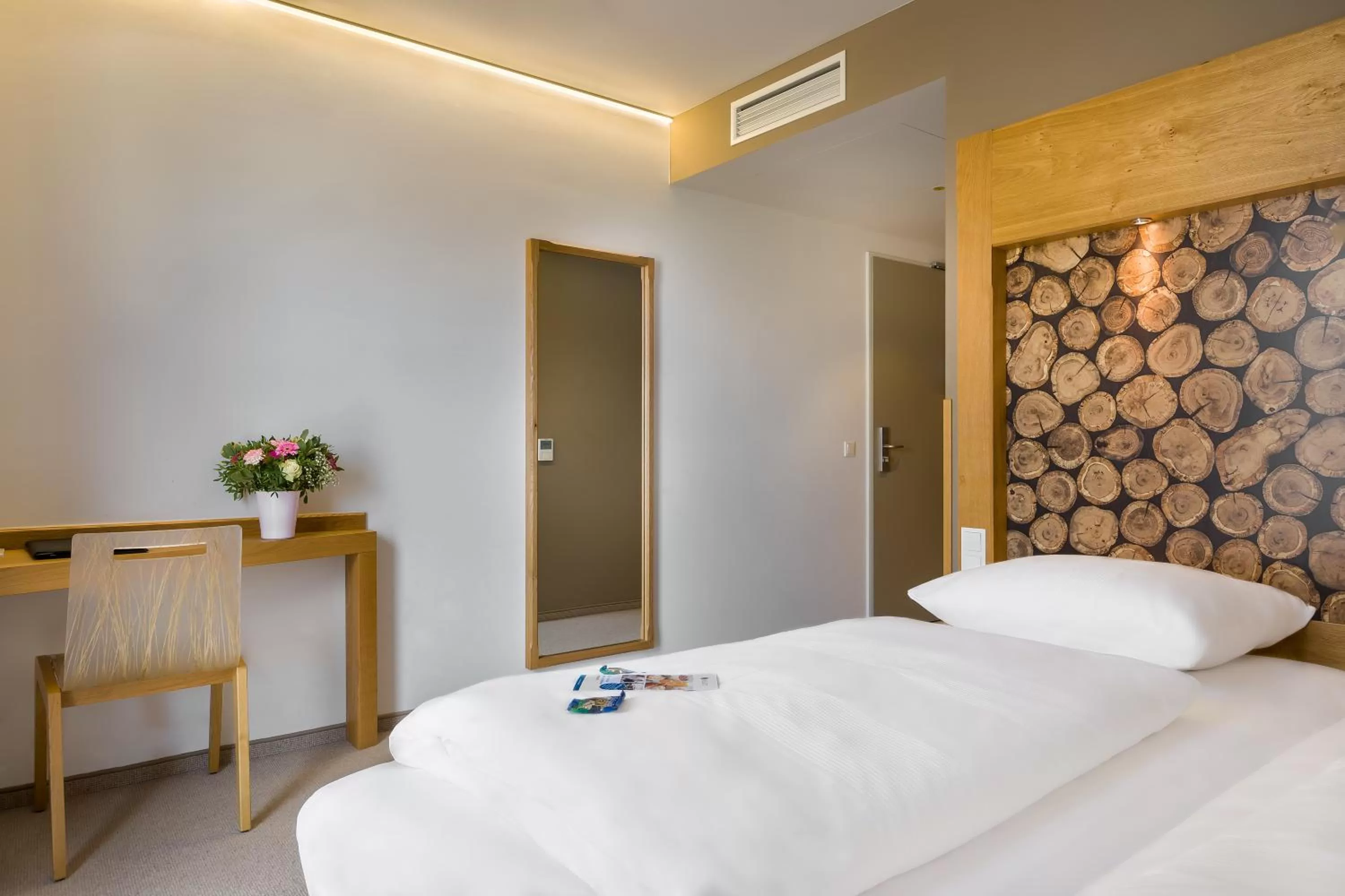 Bed in Atomis Hotel Dachau Munich