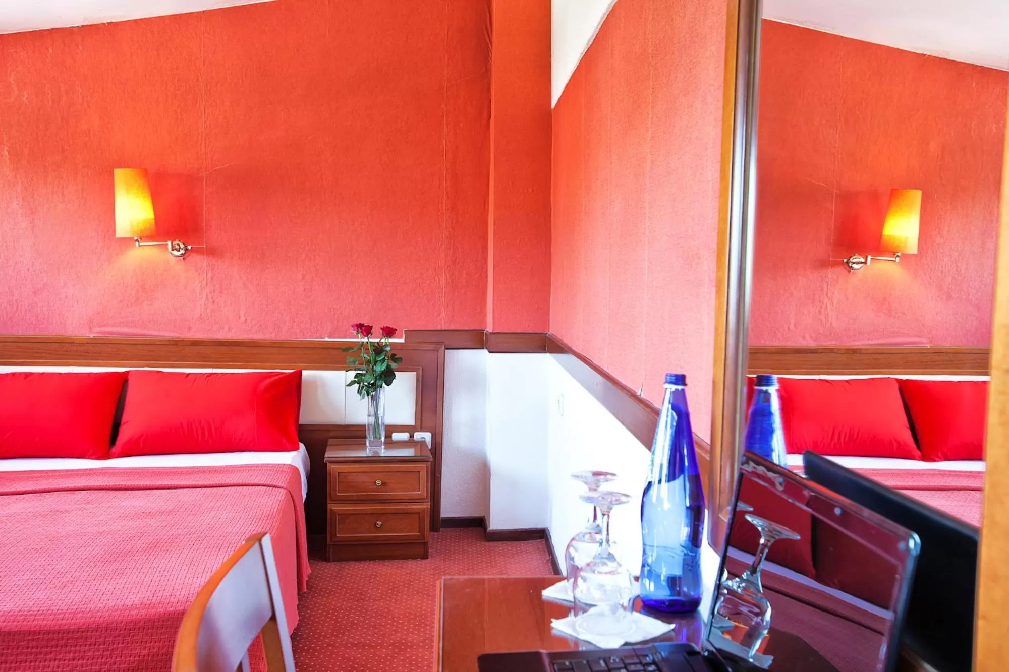 Property building, Bed in Anastassiou Hotel - Bike and motorcycle friendly hotel